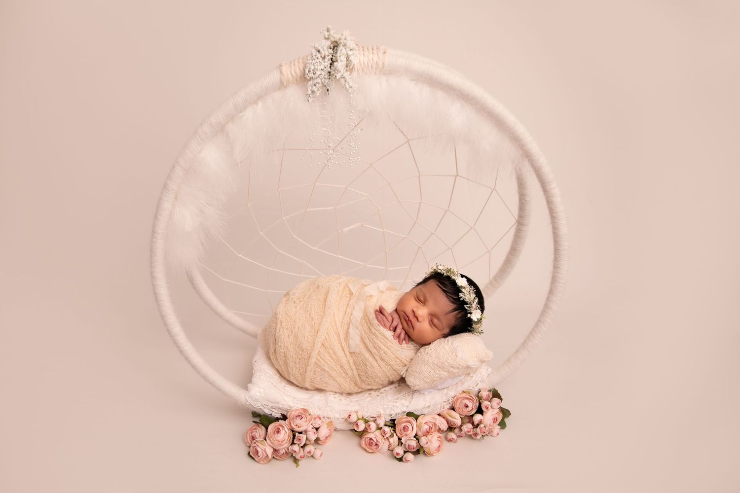 A collection of seven pink-tinted newborn baby photos showing sleeping poses in round baskets and bowls.
