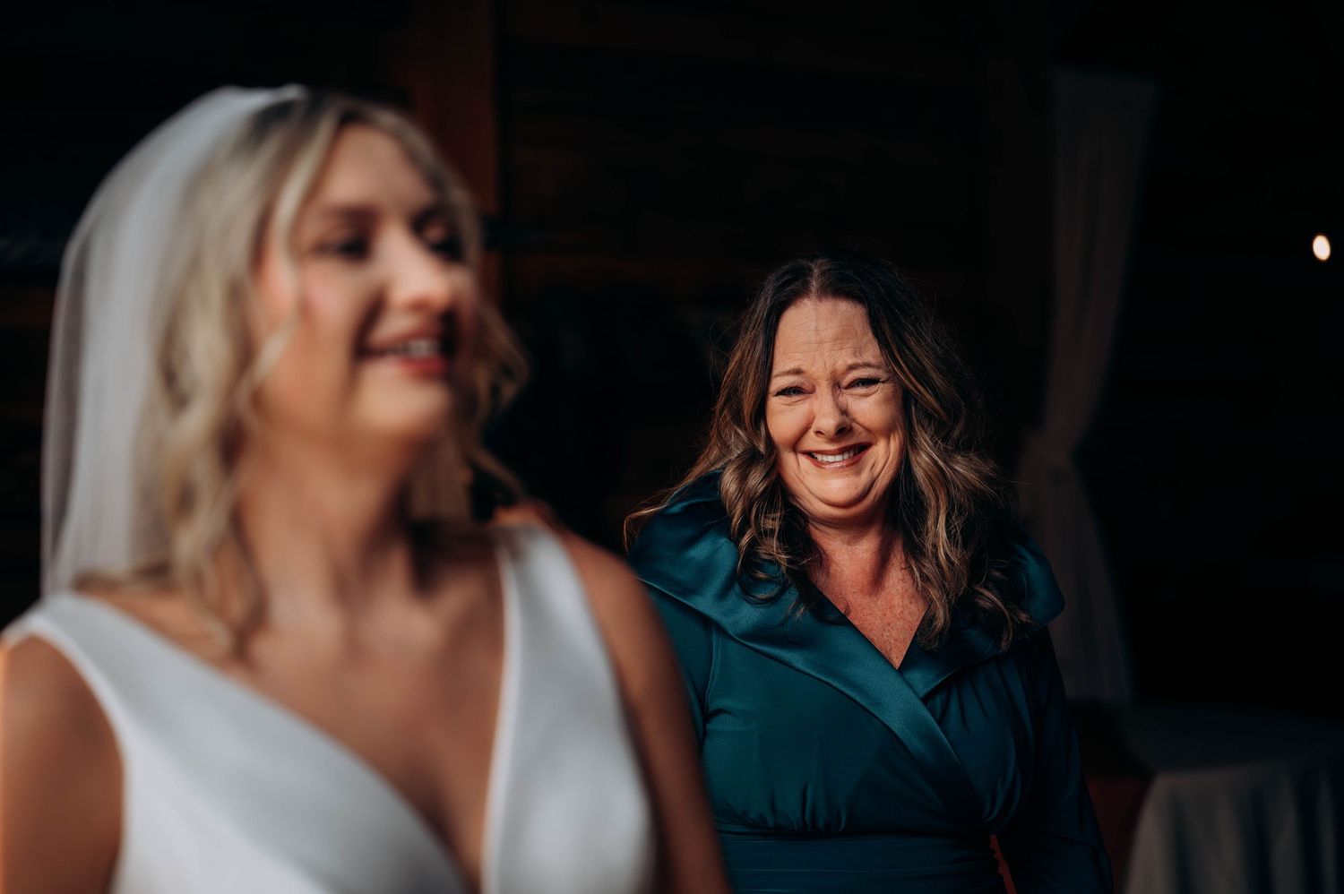 Indoor wedding celebration with warm lighting and joyful moments.