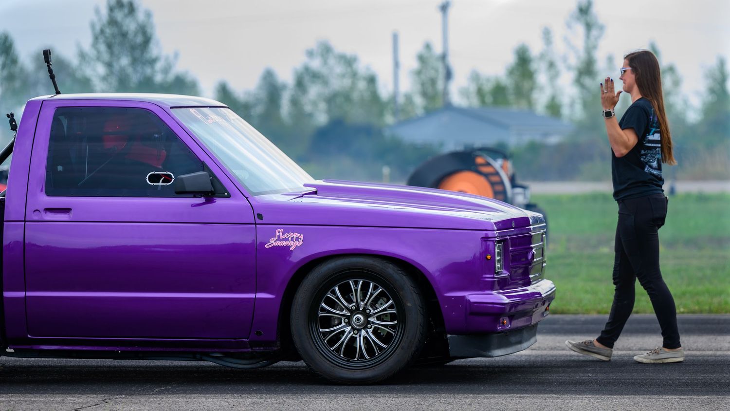 Custom purple drag racing car shown from multiple angles on a race track.
