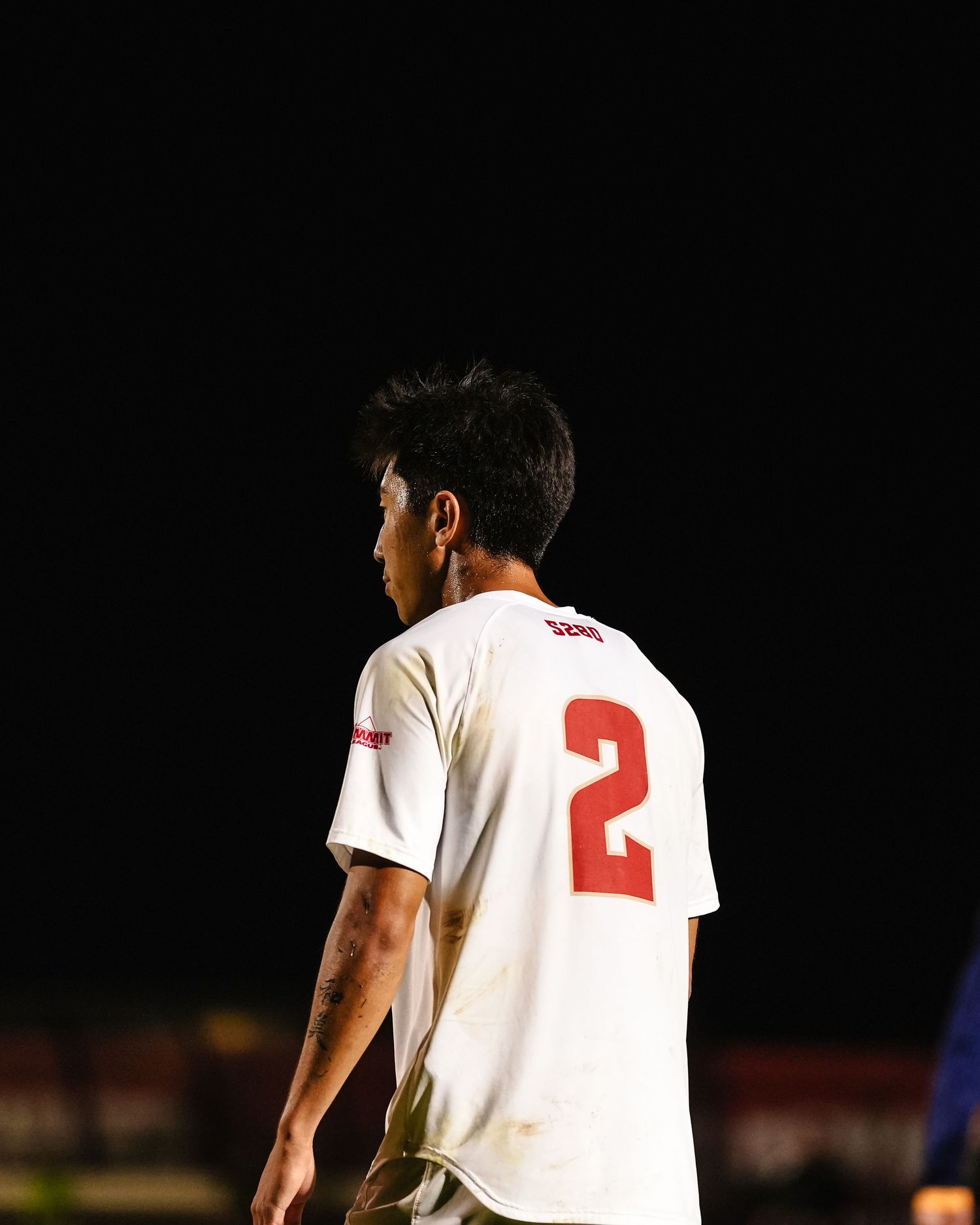 Soccer player in white jersey.