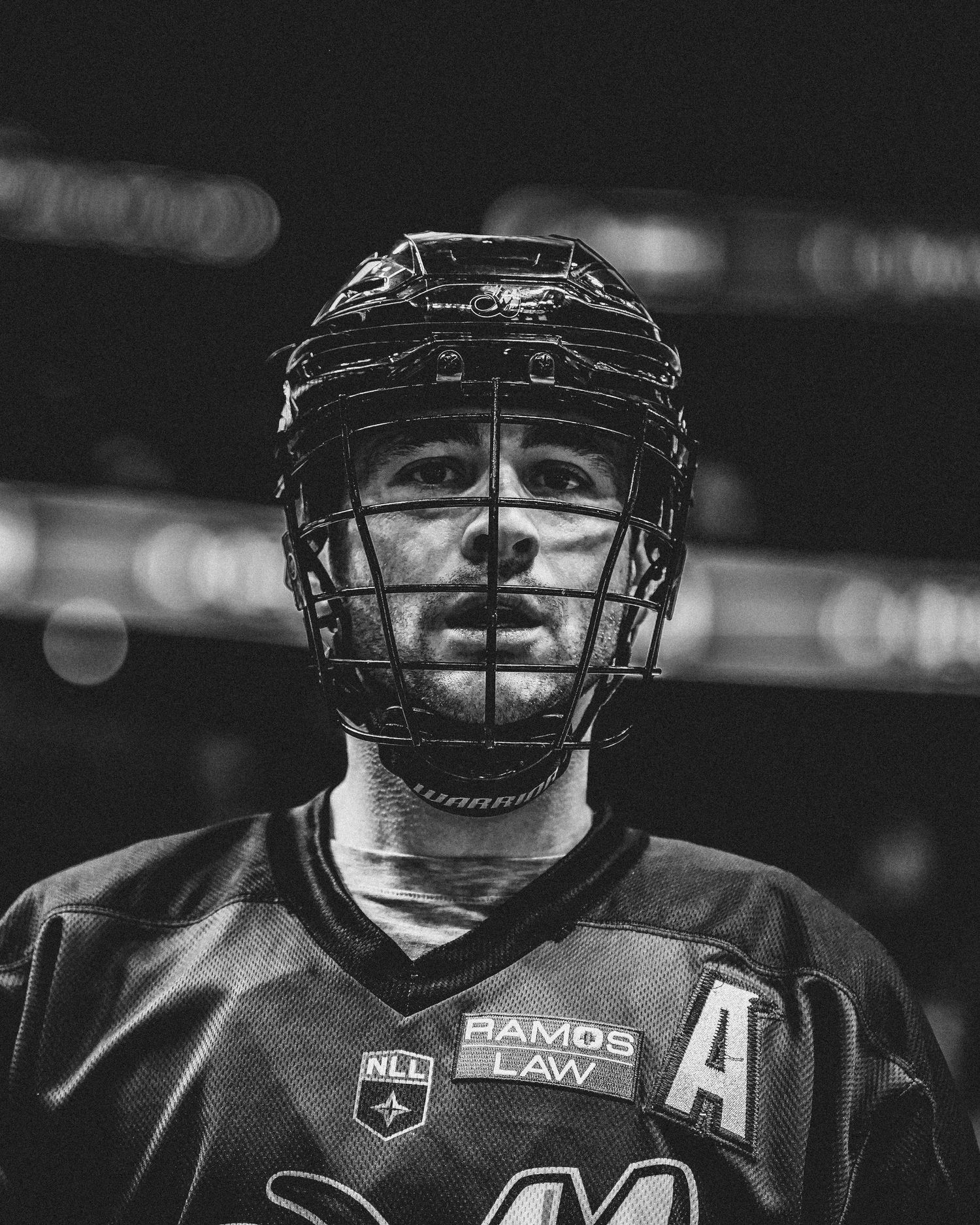Close-up of lacrosse player.
