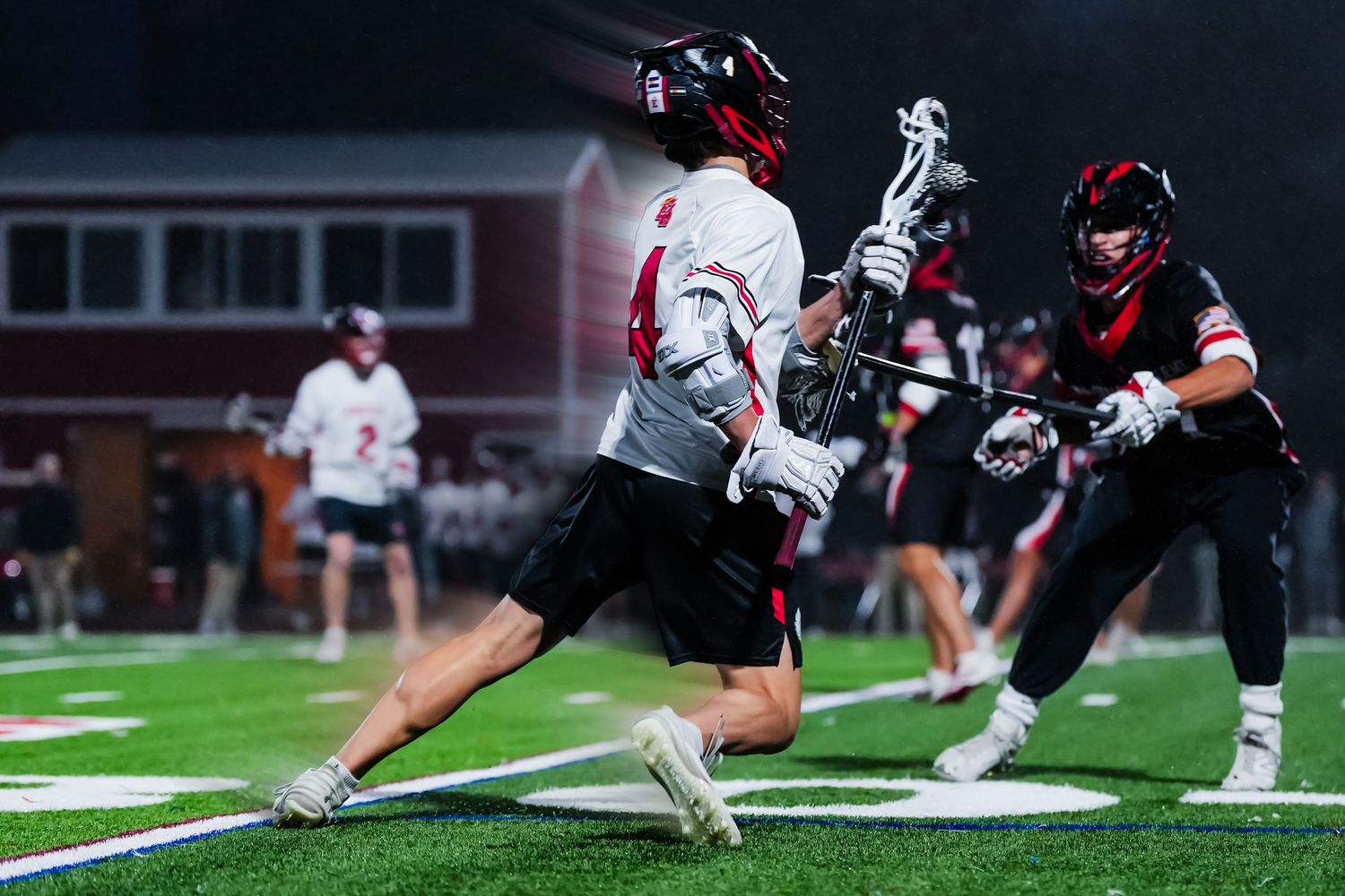 Lacrosse player making a move.