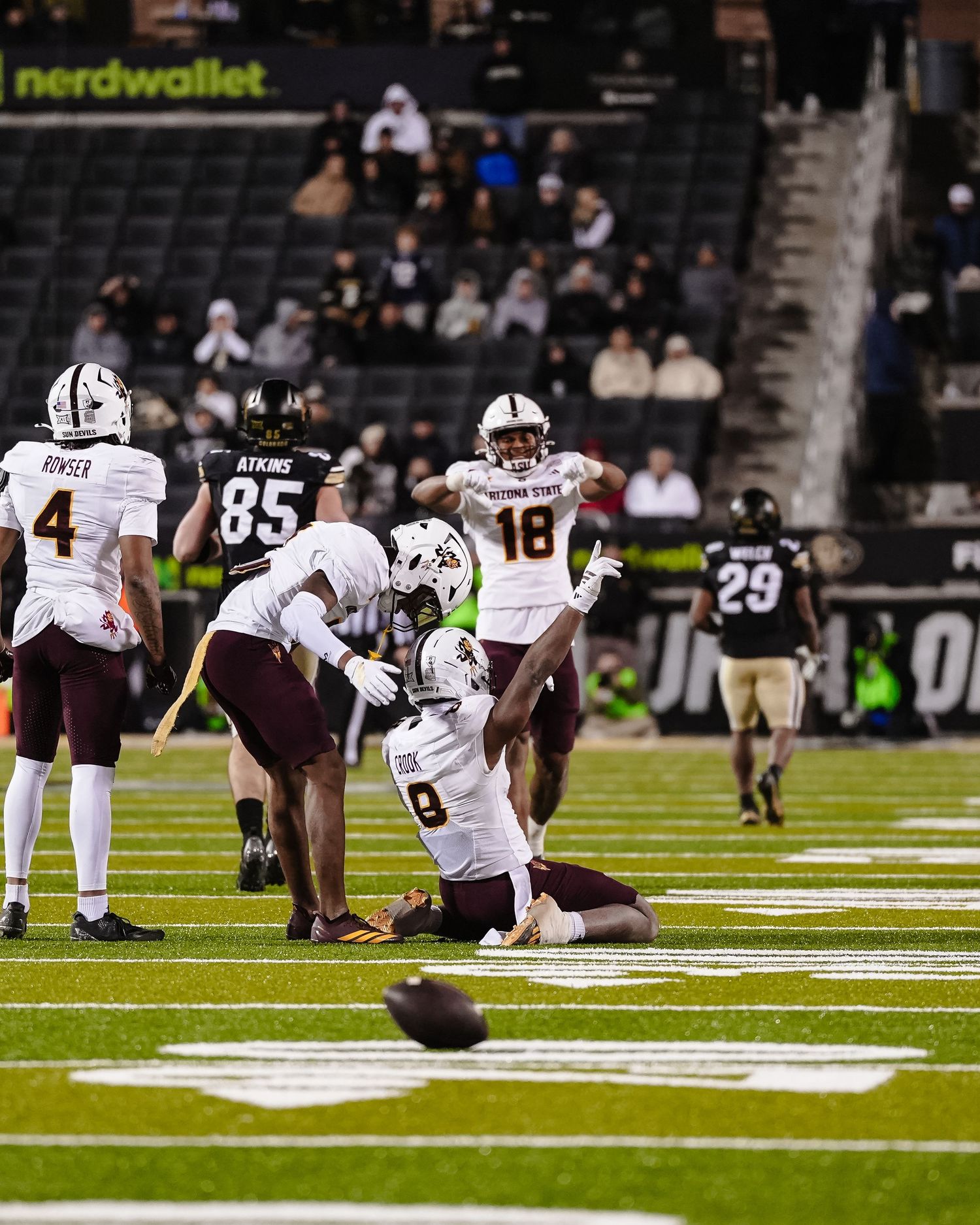 Football players celebrating.