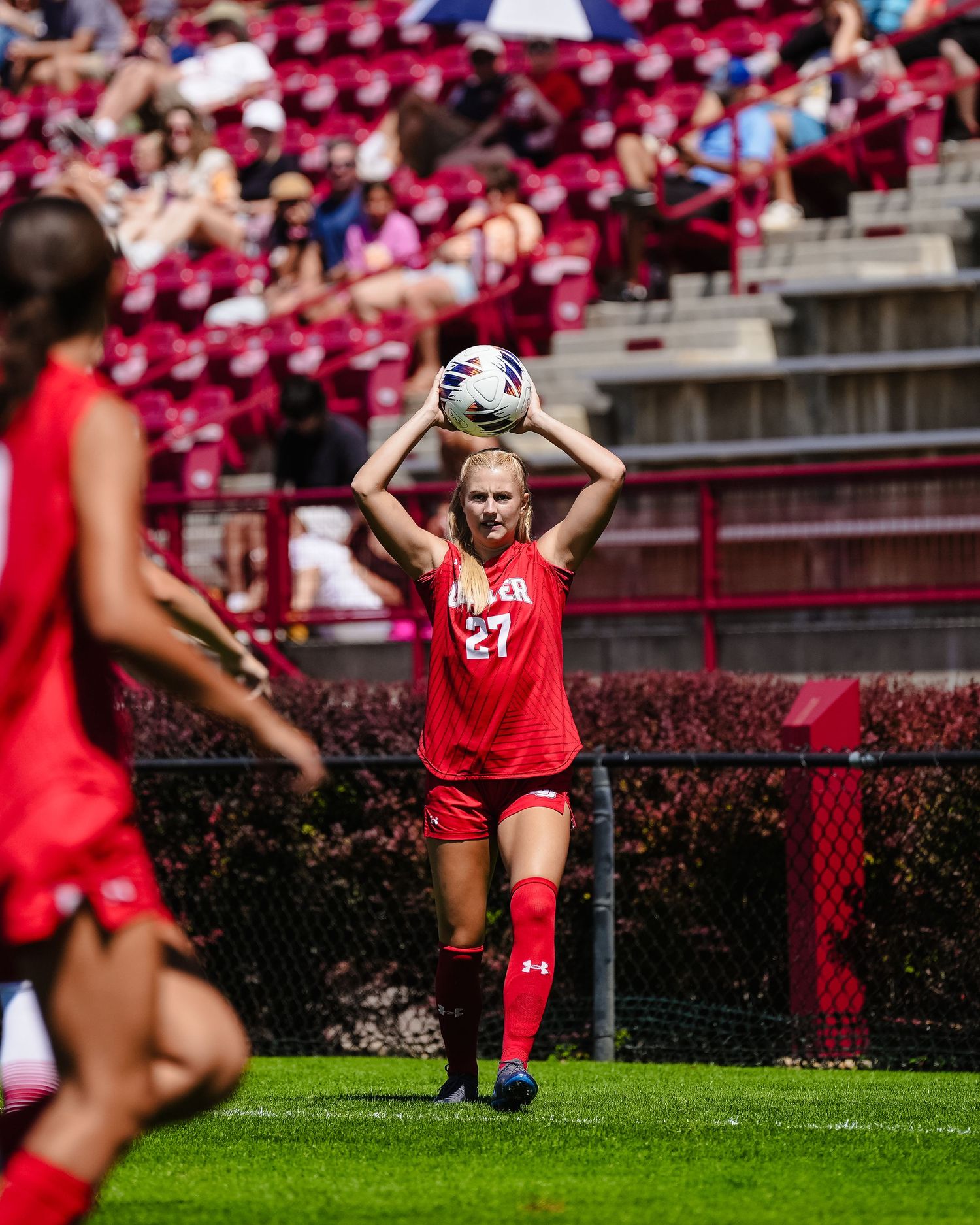 Soccer player prepares for a throw-in.