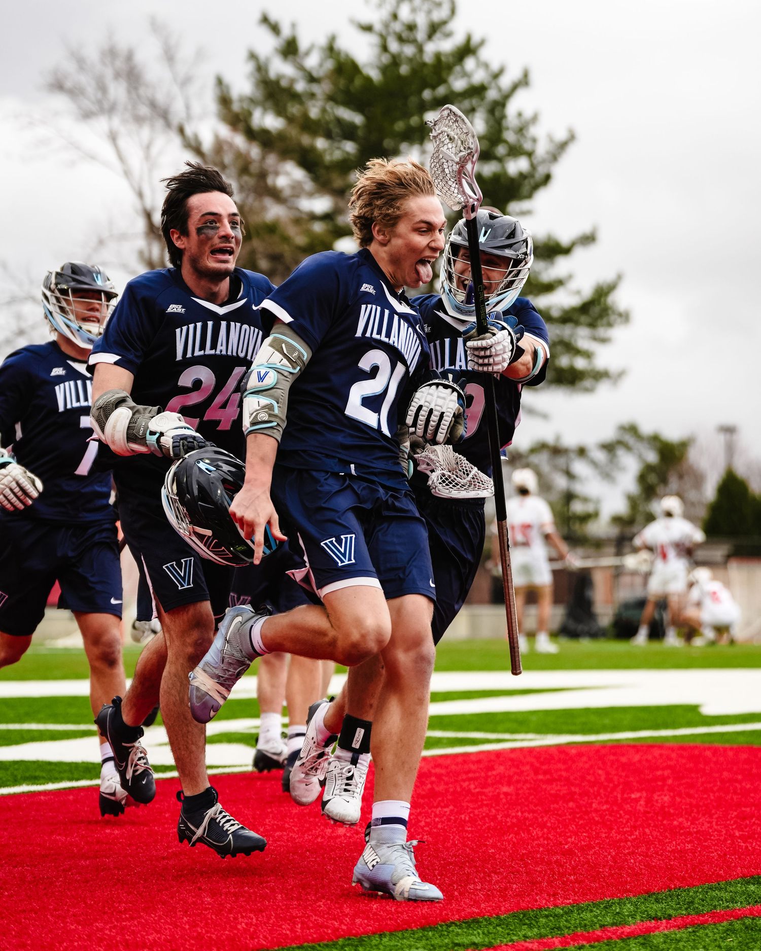 Players in navy Villanova uniforms celebrating.