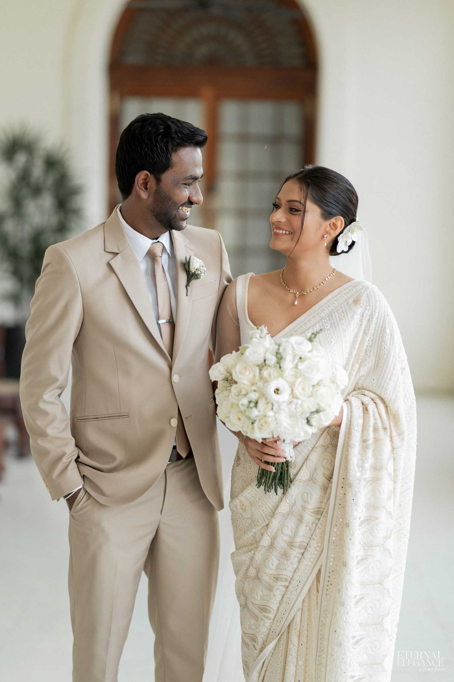 Candid wedding moment between bride and groom in Sri Lanka Natural wedding moments captured in Sri Lanka wedding photography