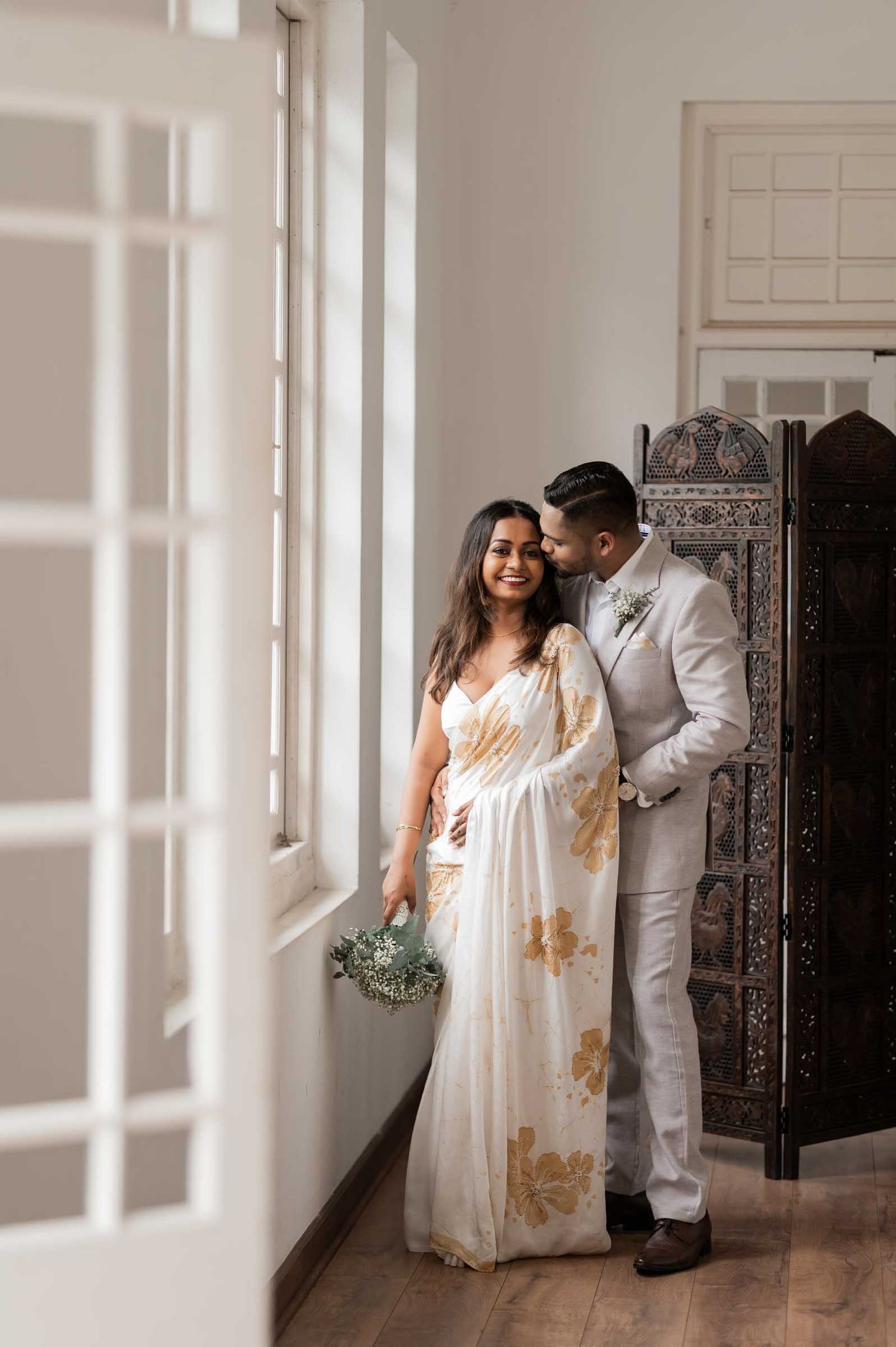 Candid wedding moment between bride and groom in Sri Lanka Natural wedding moments captured in Sri Lanka