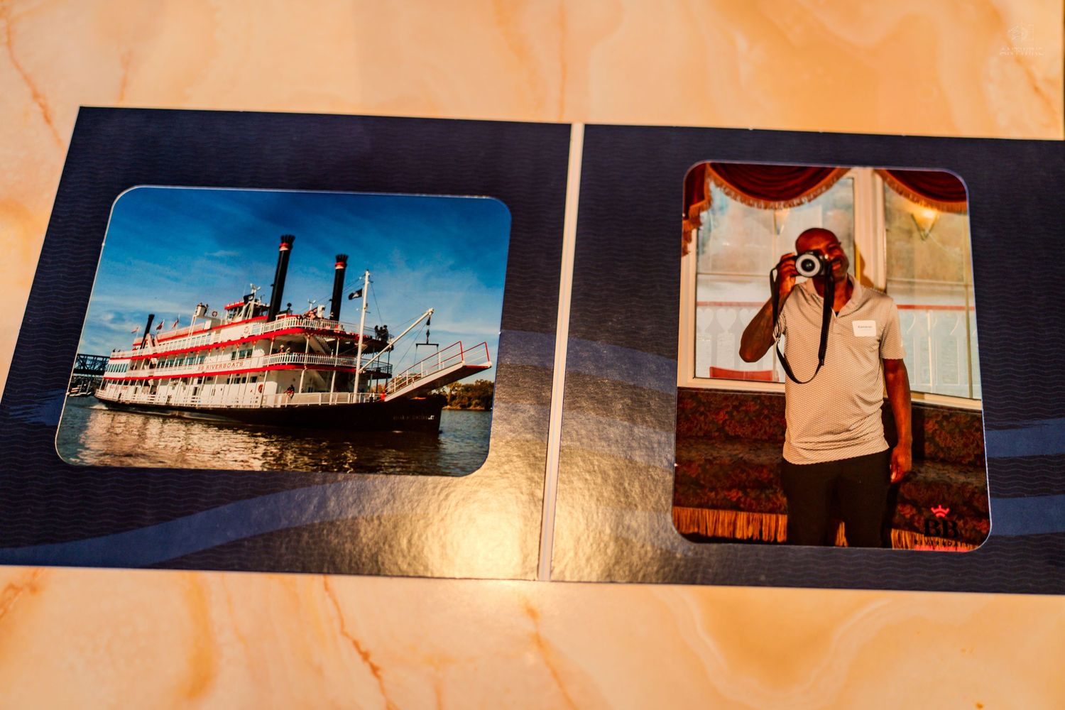 Photo album showing a Mississippi riverboat steamship and a woman taking a selfie with a film camera.