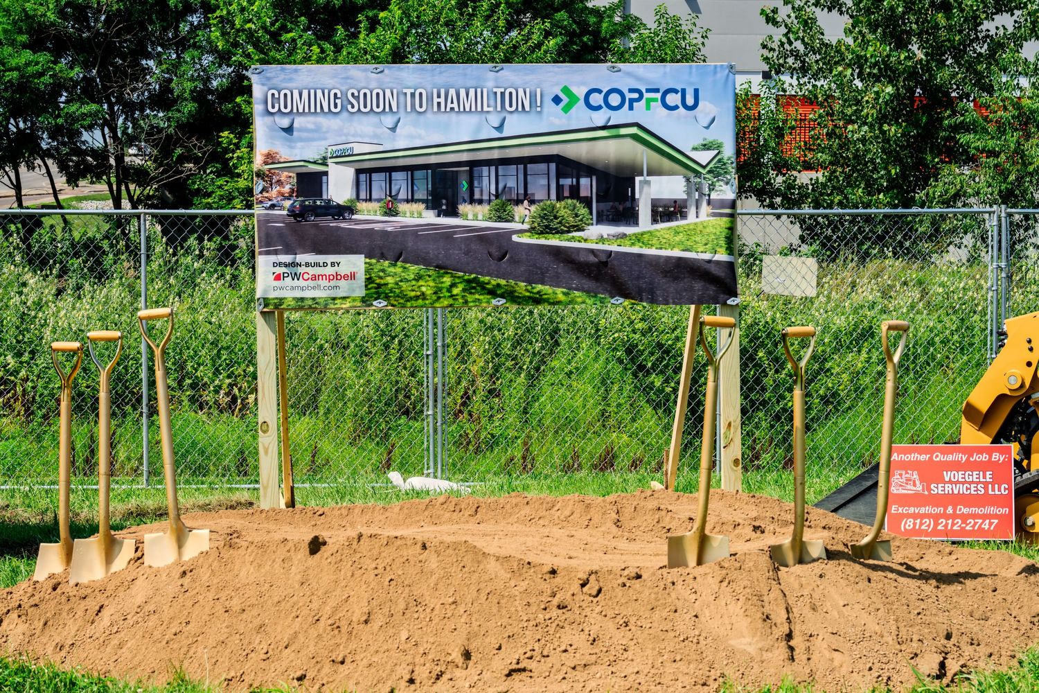 COPCU coming soon to Hamilton groundbreaking site featuring golden shovels and construction signage outdoors.