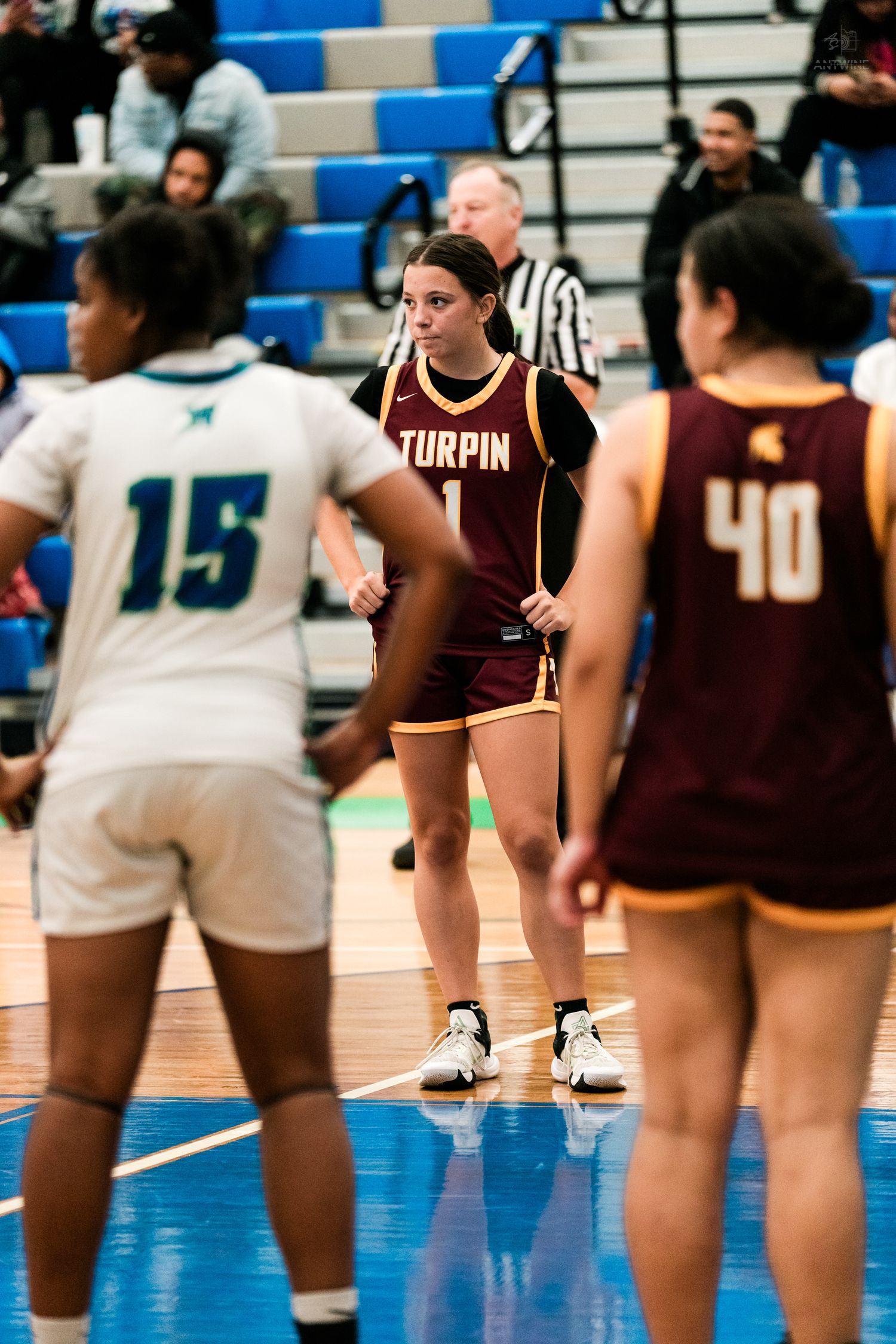 Turpin #1 focuses during a girls high school basketball game against the Warriors.