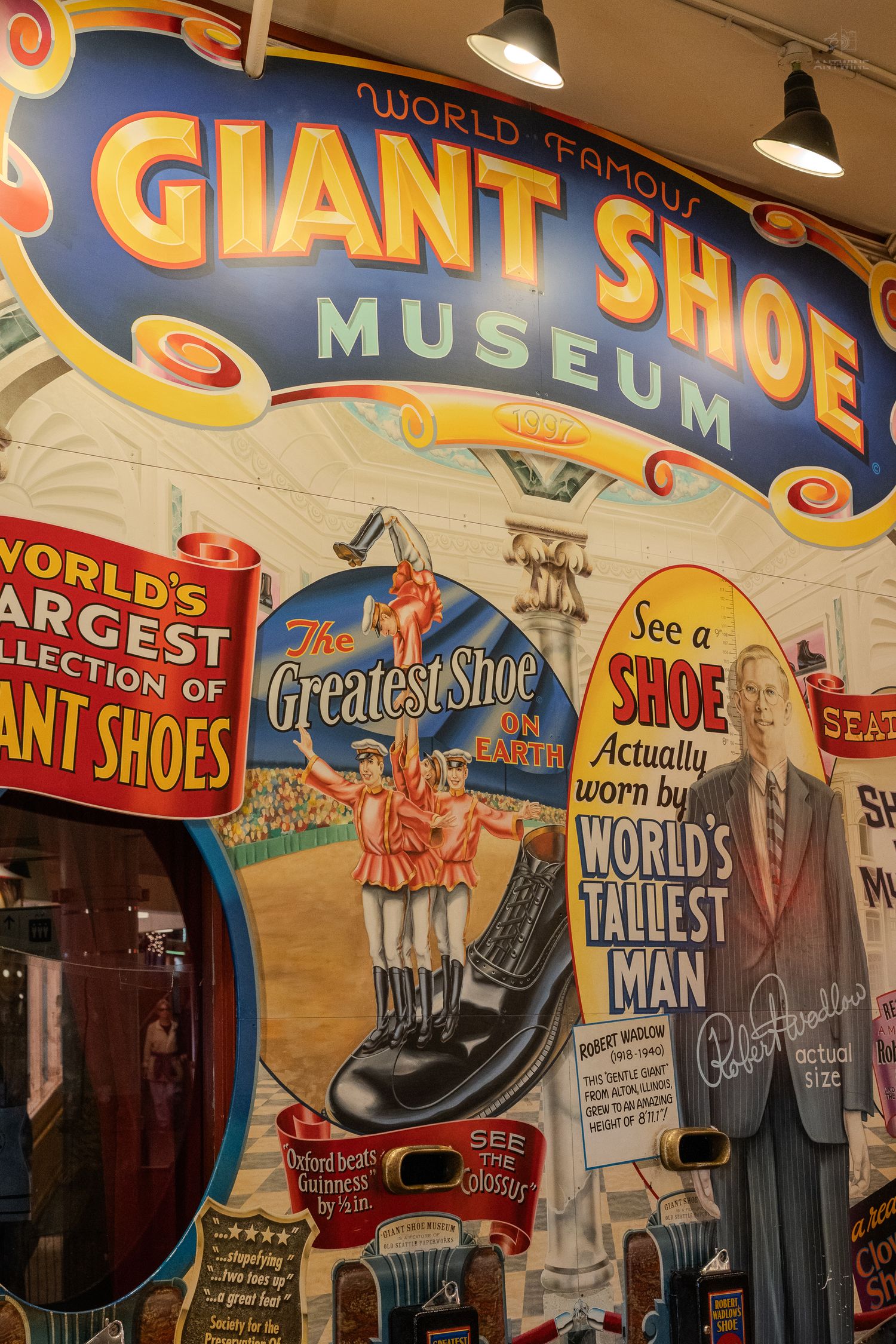 World Famous Giant Shoe Museum colorful vintage sign at Pike Place Market in Seattle, Washington.