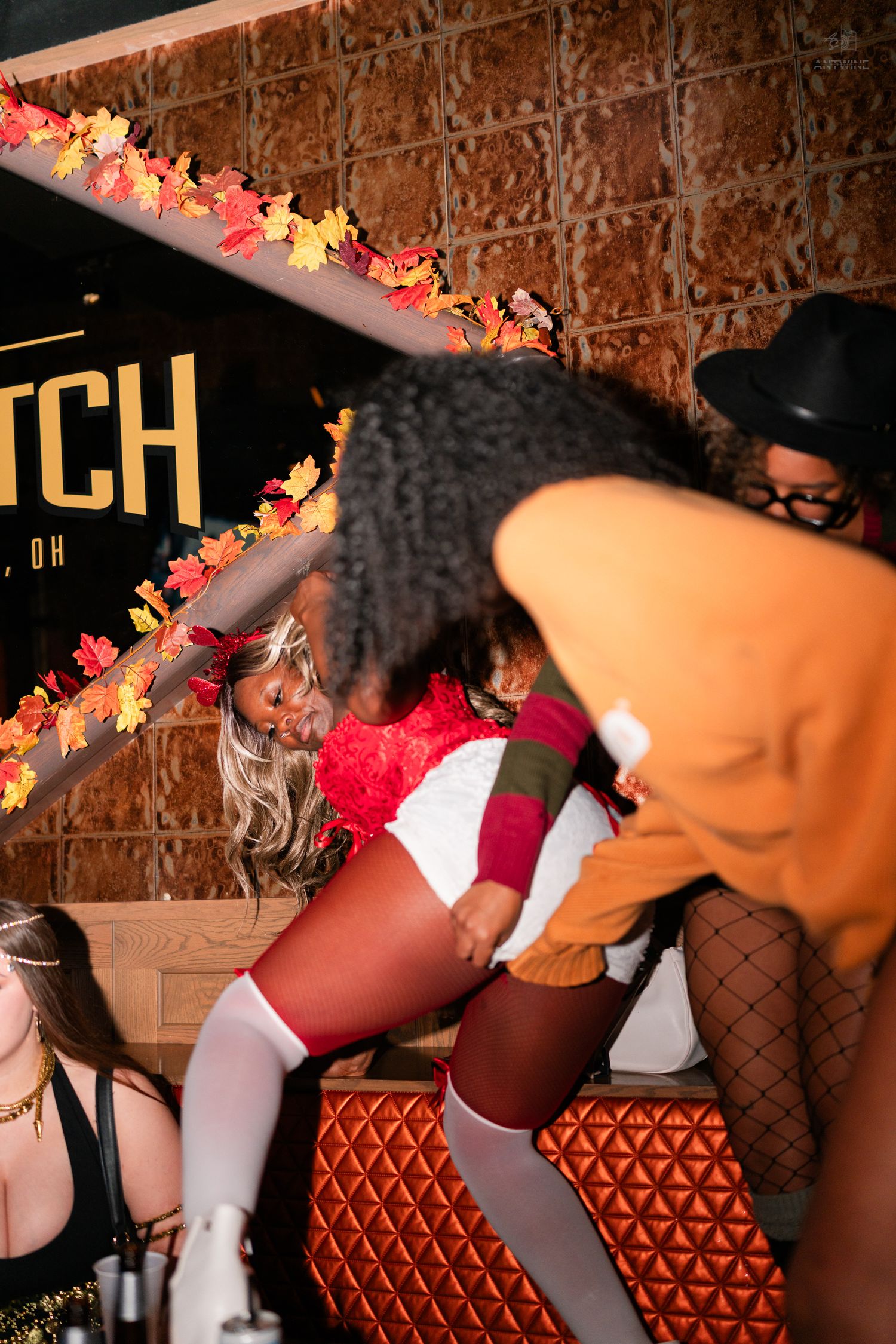 Women in Halloween costumes dancing and having fun at The Stretch bar in Cincinnati OH.