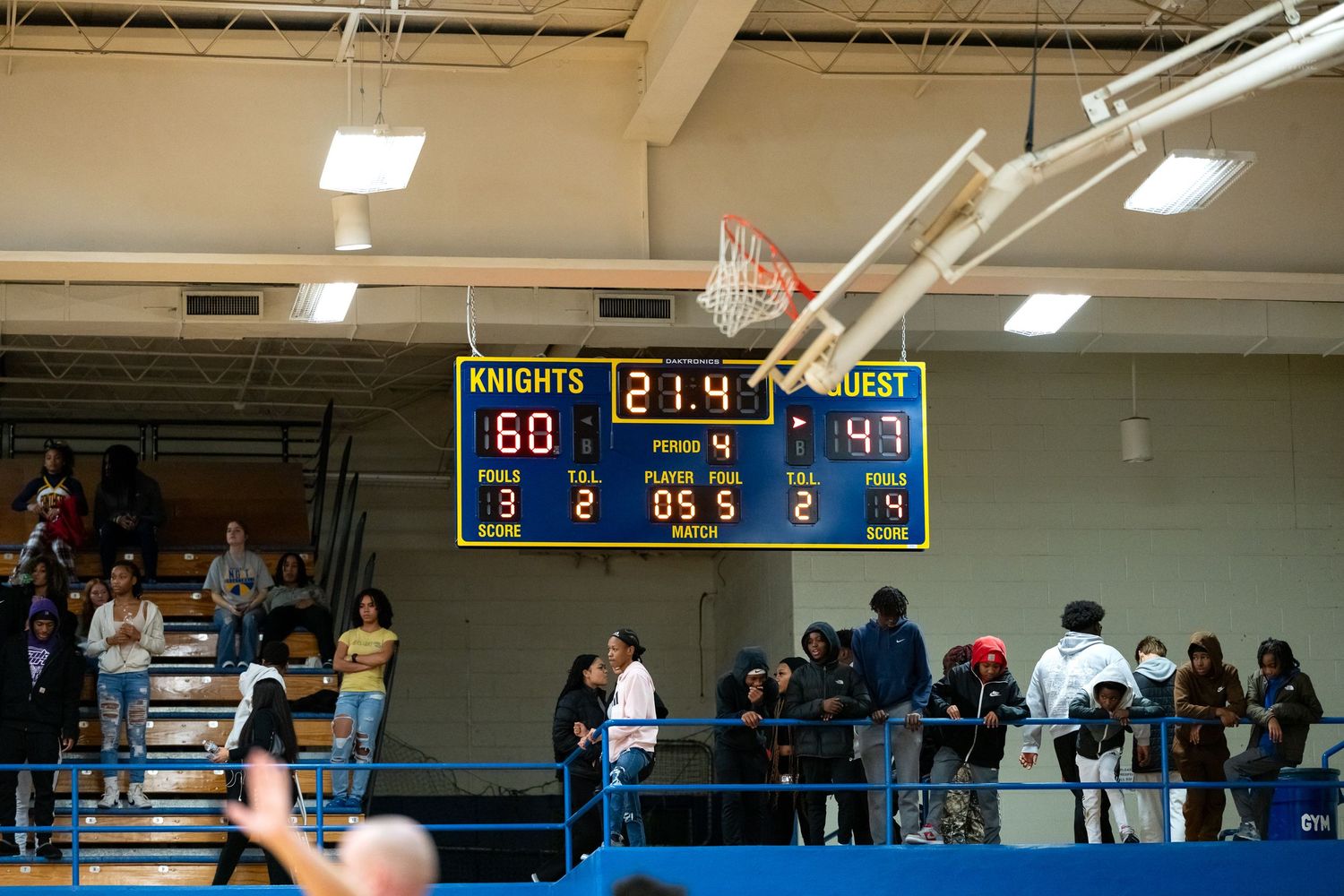 Scoreboard shows Knights leading 60-49 in period 2 with 5.5 seconds remaining in the game.