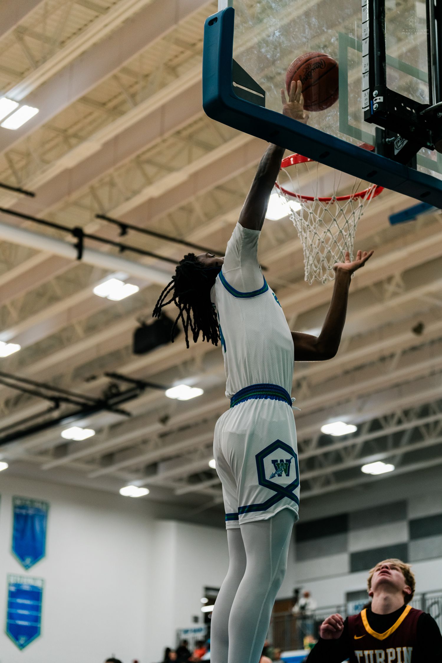 Winton Woods Warriors player dunks the basketball during a high school game against Turpin.