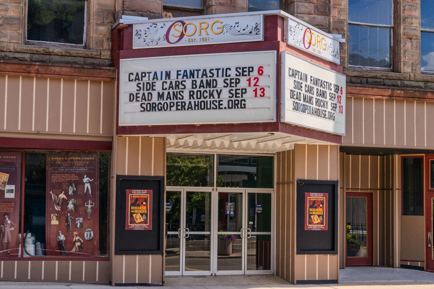 Historic SOR Opera House theater marquee advertising Captain Fantastic, Side Cars Band, and Dead Mans Rocky shows in September.