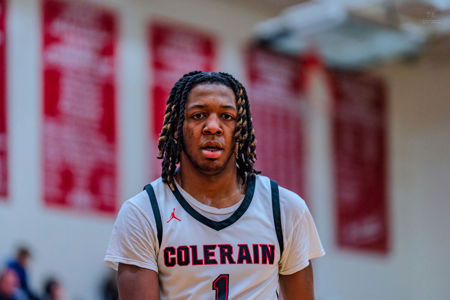 Colerain high school basketball player number 1 looks up during a varsity game.