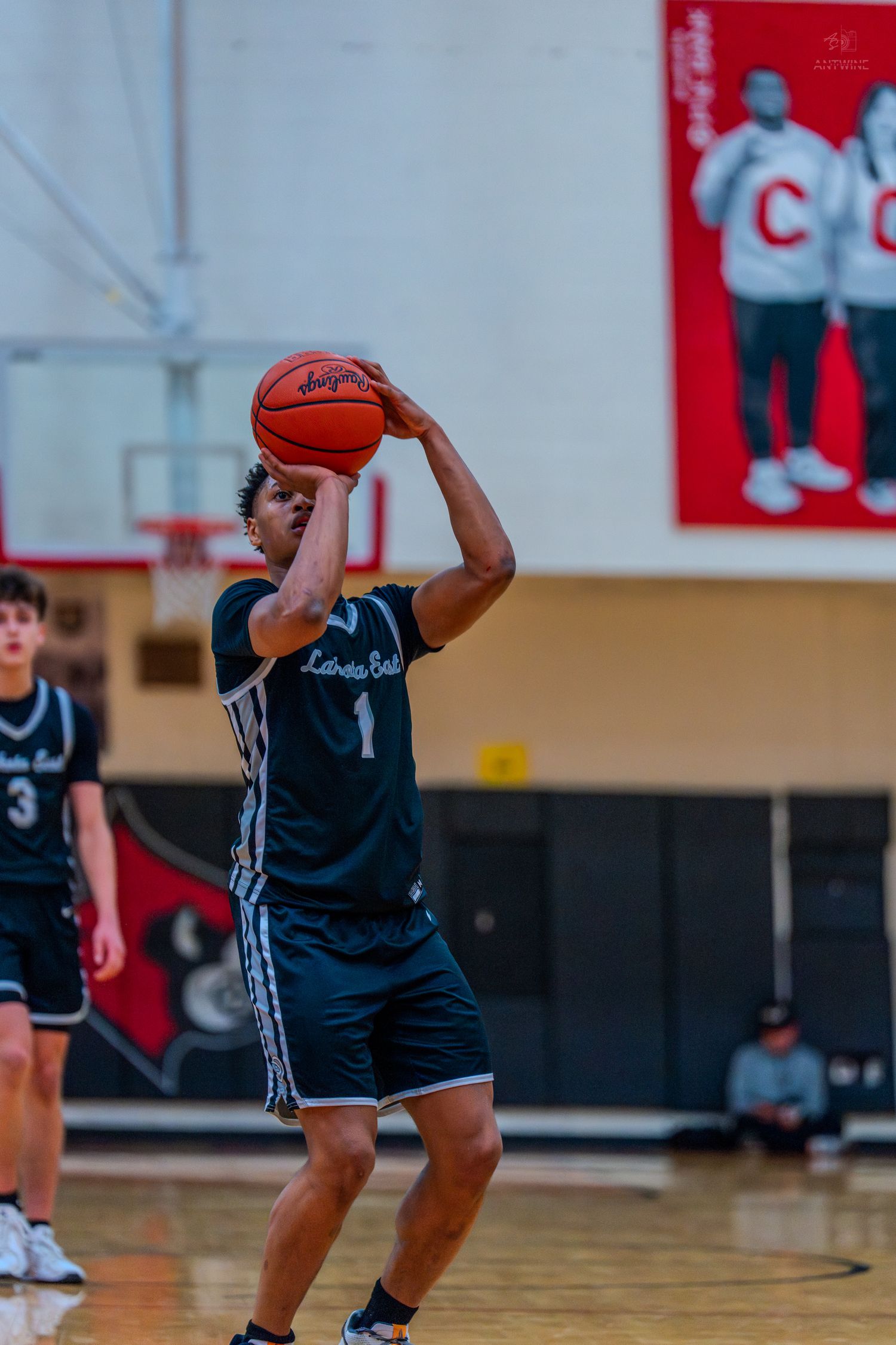 Lakota East #1 shoots a free throw during a high school basketball game.