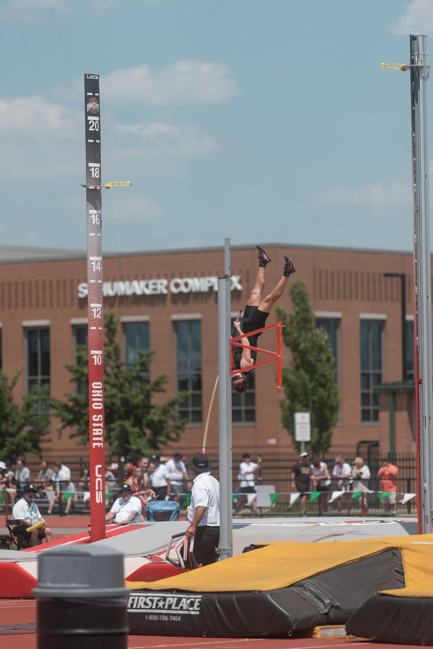 Pole vaulter clears the bar at approximately 18 feet at Ohio State University Schottenstein track complex.
