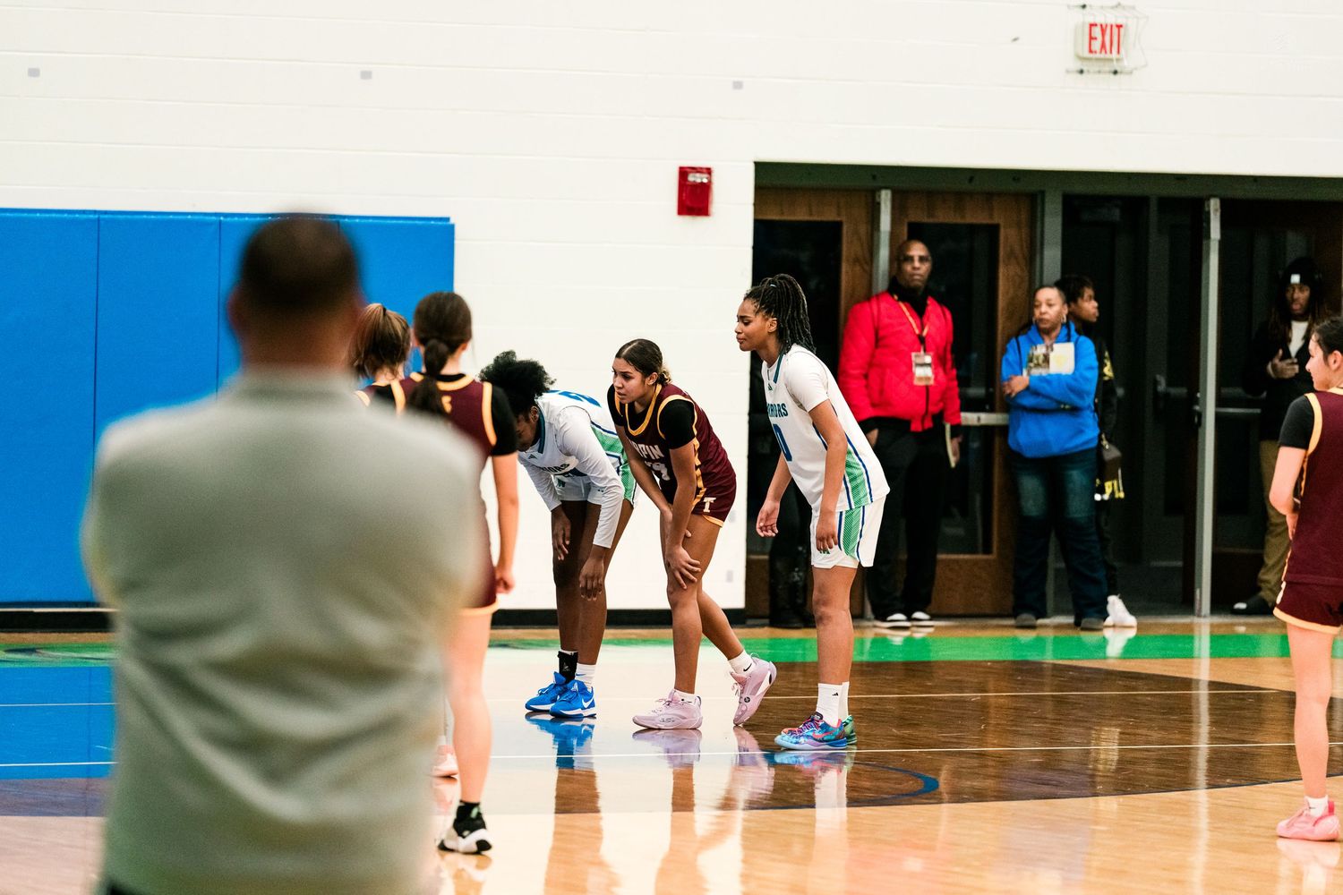 Warriors and Turpin players line up for a free throw during a girls high school basketball game.