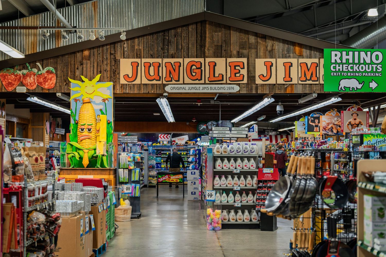 Jungle Jim's International Market entrance with colorful corn mascot and Rhino Checkouts sign.