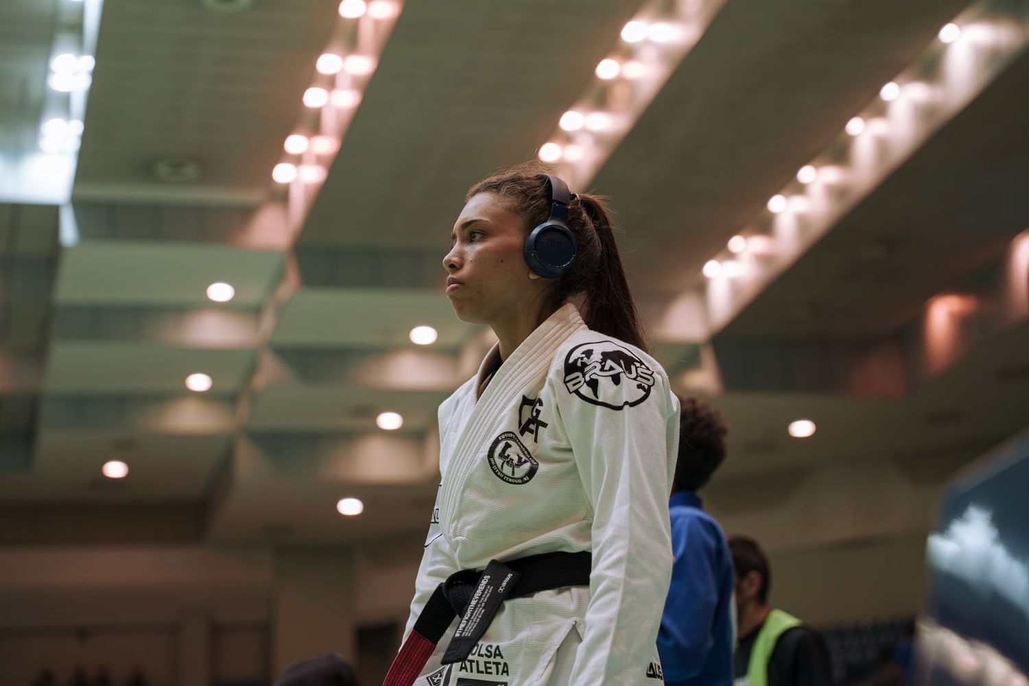 Professional combat sports photography capturing athletes competing in martial arts event with dynamic action and authentic emotion.