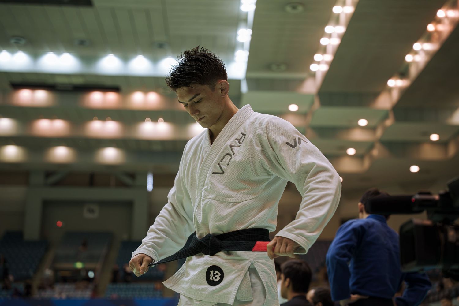 Professional combat sports photography capturing athletes competing in martial arts event with dynamic action and authentic emotion.