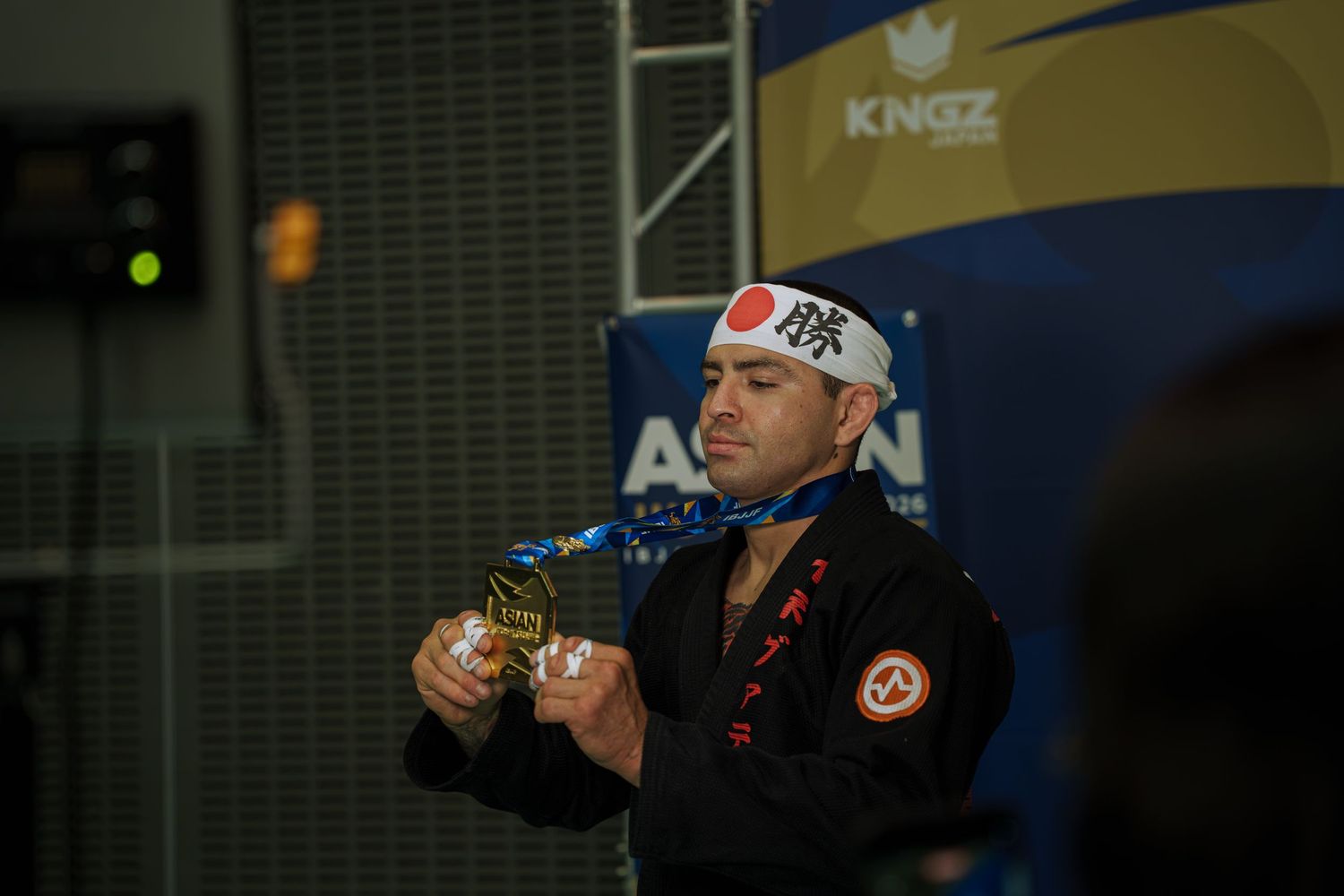 Professional combat sports photography capturing athletes competing in martial arts event with dynamic action and authentic emotion.