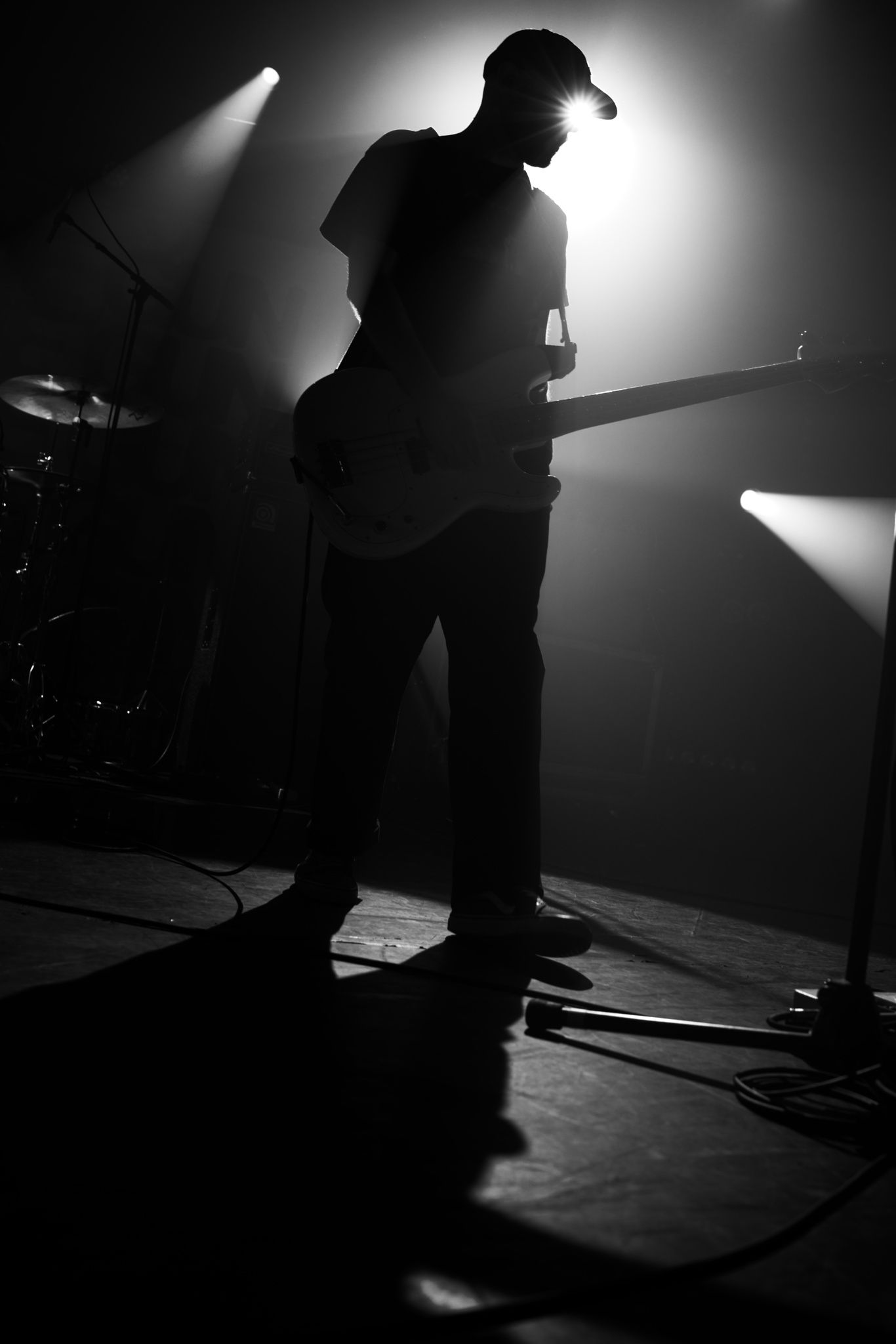 Spite House bass player silhouette