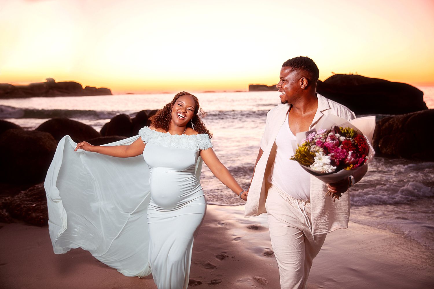 Clifton beach capturing beautiful maternity photo shoot. Cape Town Maternity photographer. Gender reveal photo shoot in Cape Town. Matern