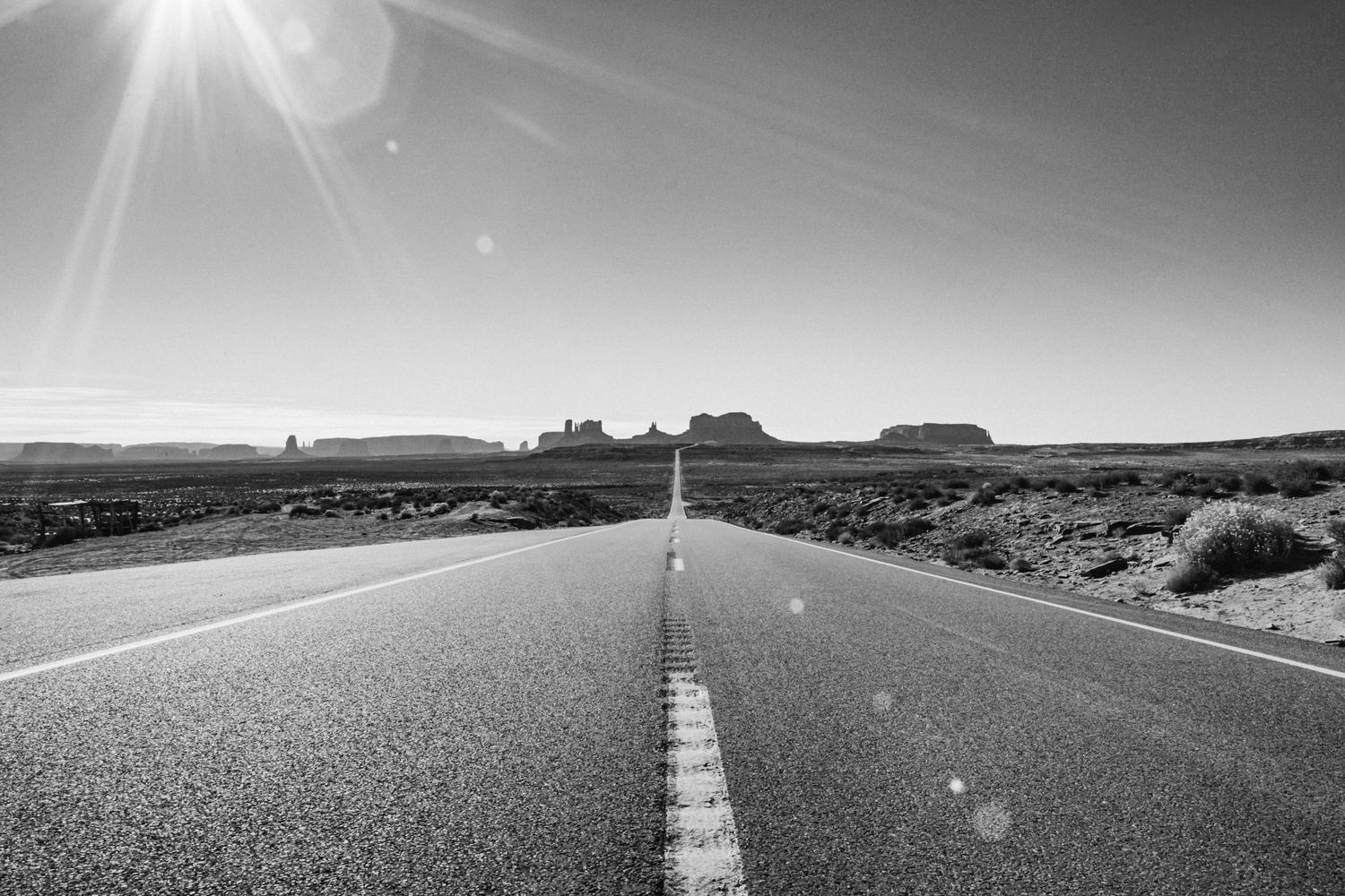 Black and white landscape of Monument Valley rock formations in Utah