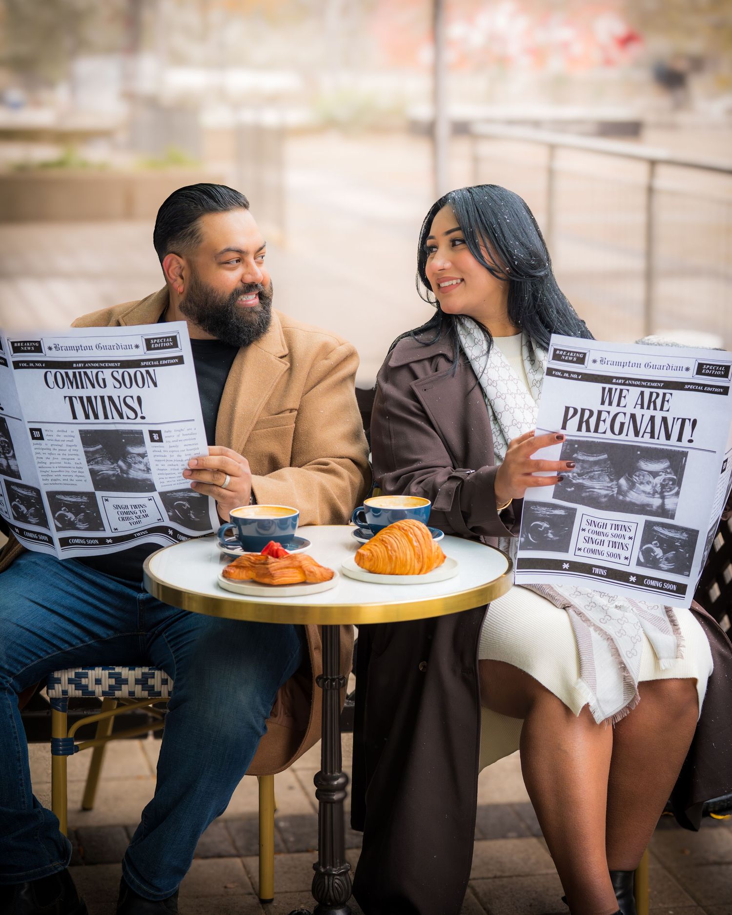 Creative pregnancy announcement photo series showing couple reading newspapers with surprise headlines at cafe.