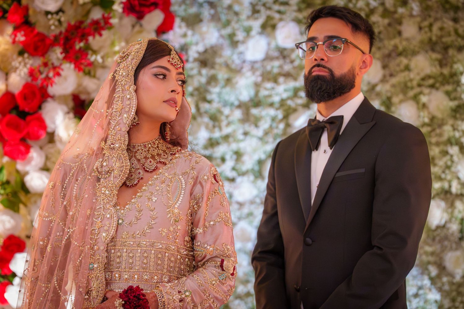 Wedding ceremony moments captured with traditional South Asian bridal dress and decor.
