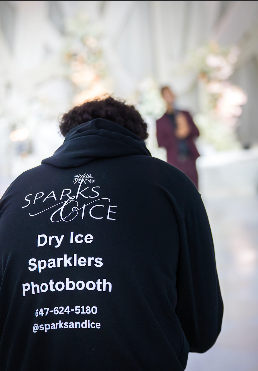 Black hooded sweatshirts with 'Sparks & Ice' branding and contact information displayed on the backs.