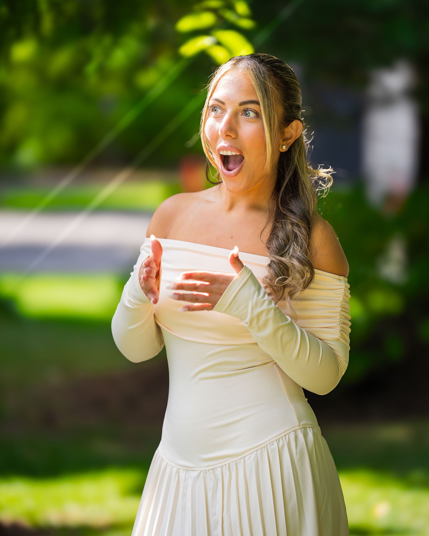An emotional reaction captured during a surprise moment in a garden setting.