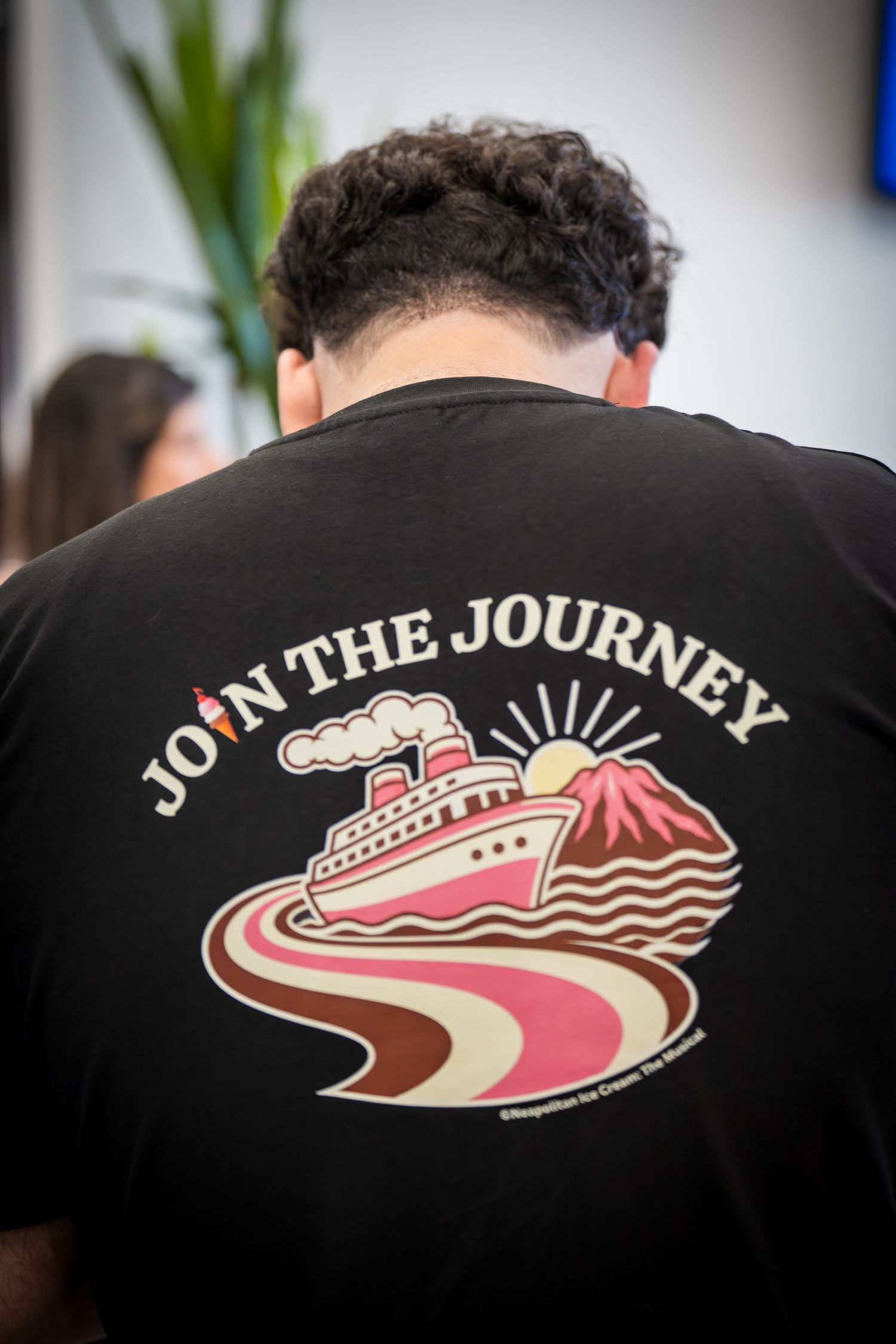 Black t-shirt with Join The Journey cruise ship graphic design.