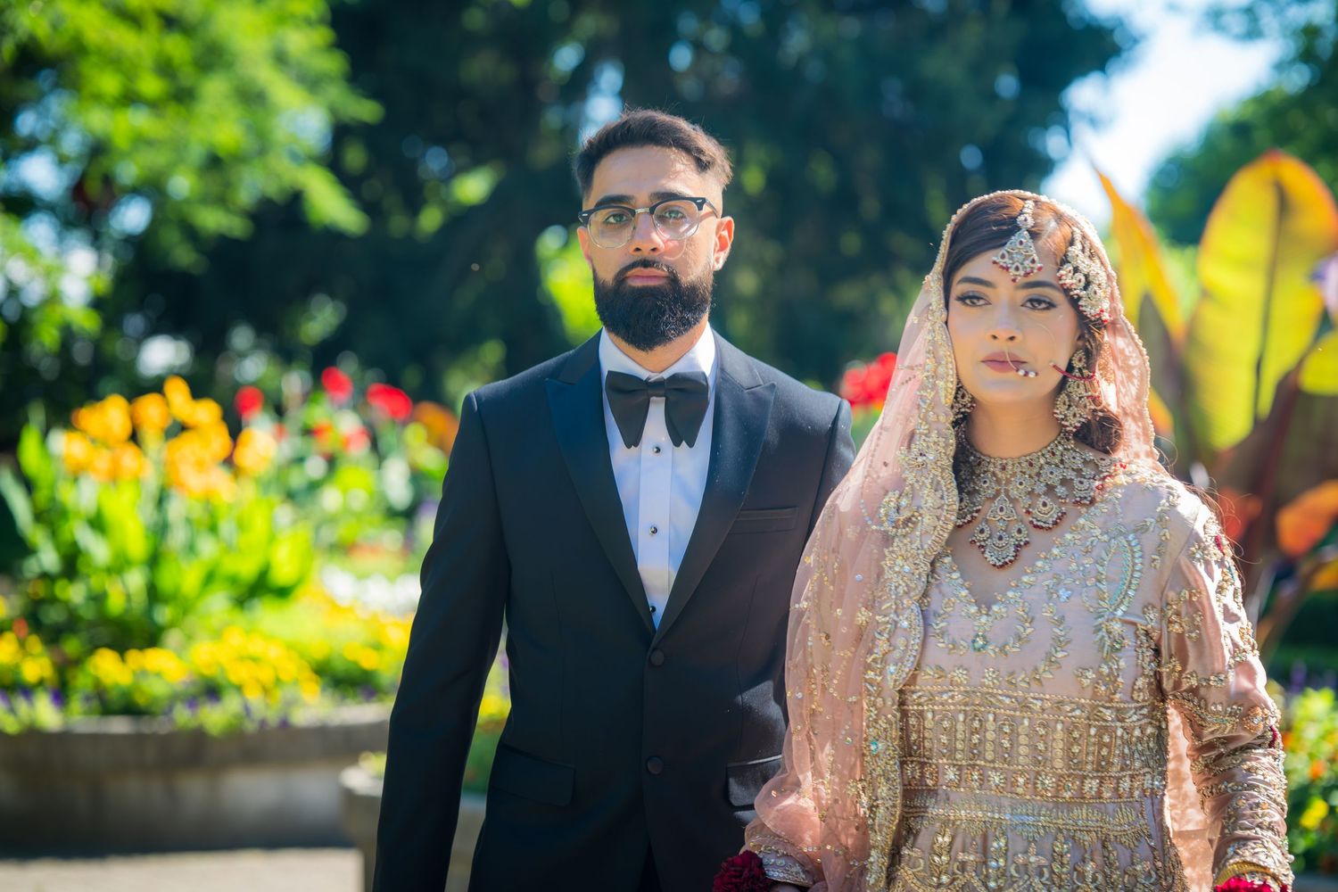 Outdoor wedding photography series featuring traditional cultural attire and natural lighting.