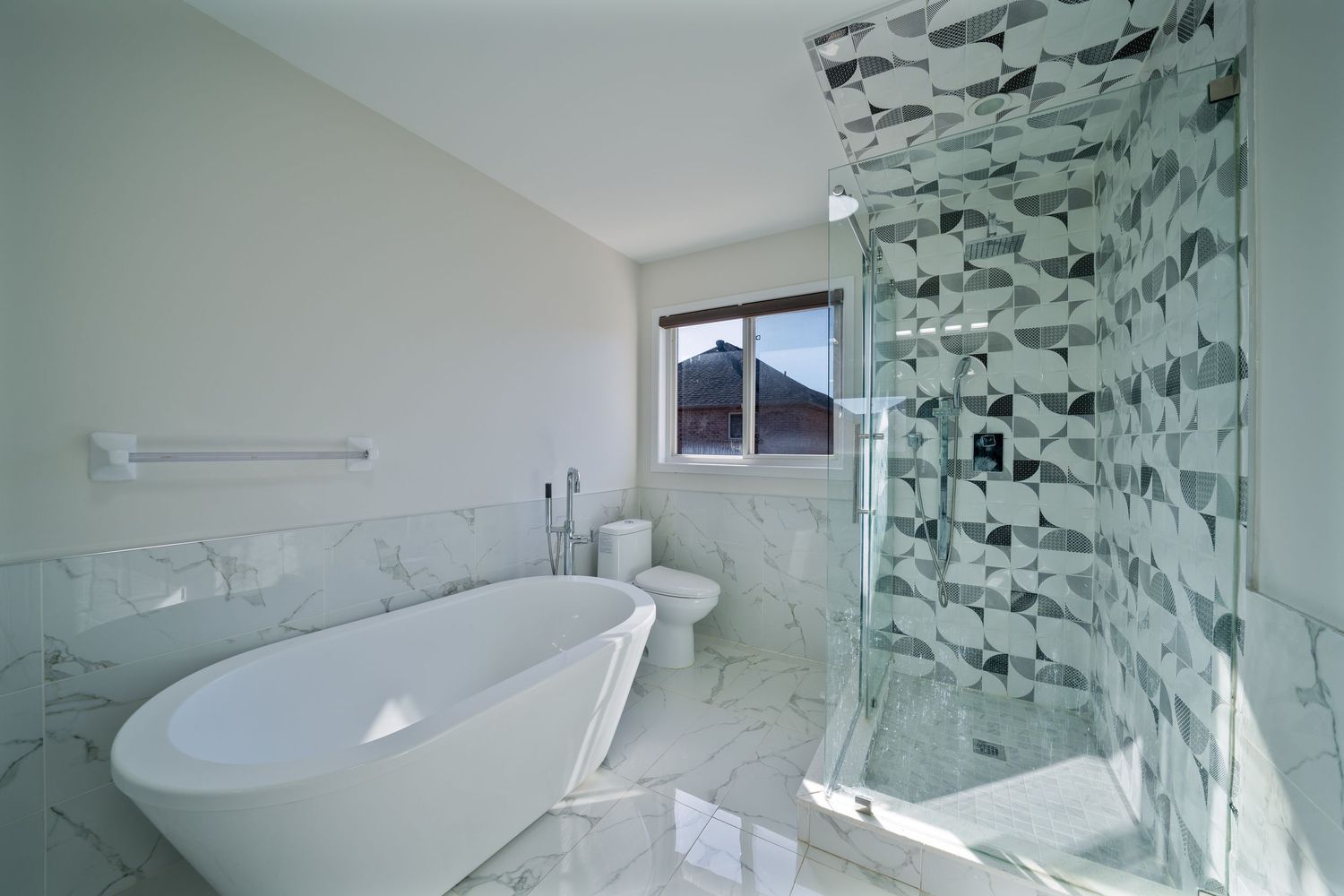 Modern bathroom interior with fish-patterned wallpaper, white fixtures, and sleek minimalist design elements.
