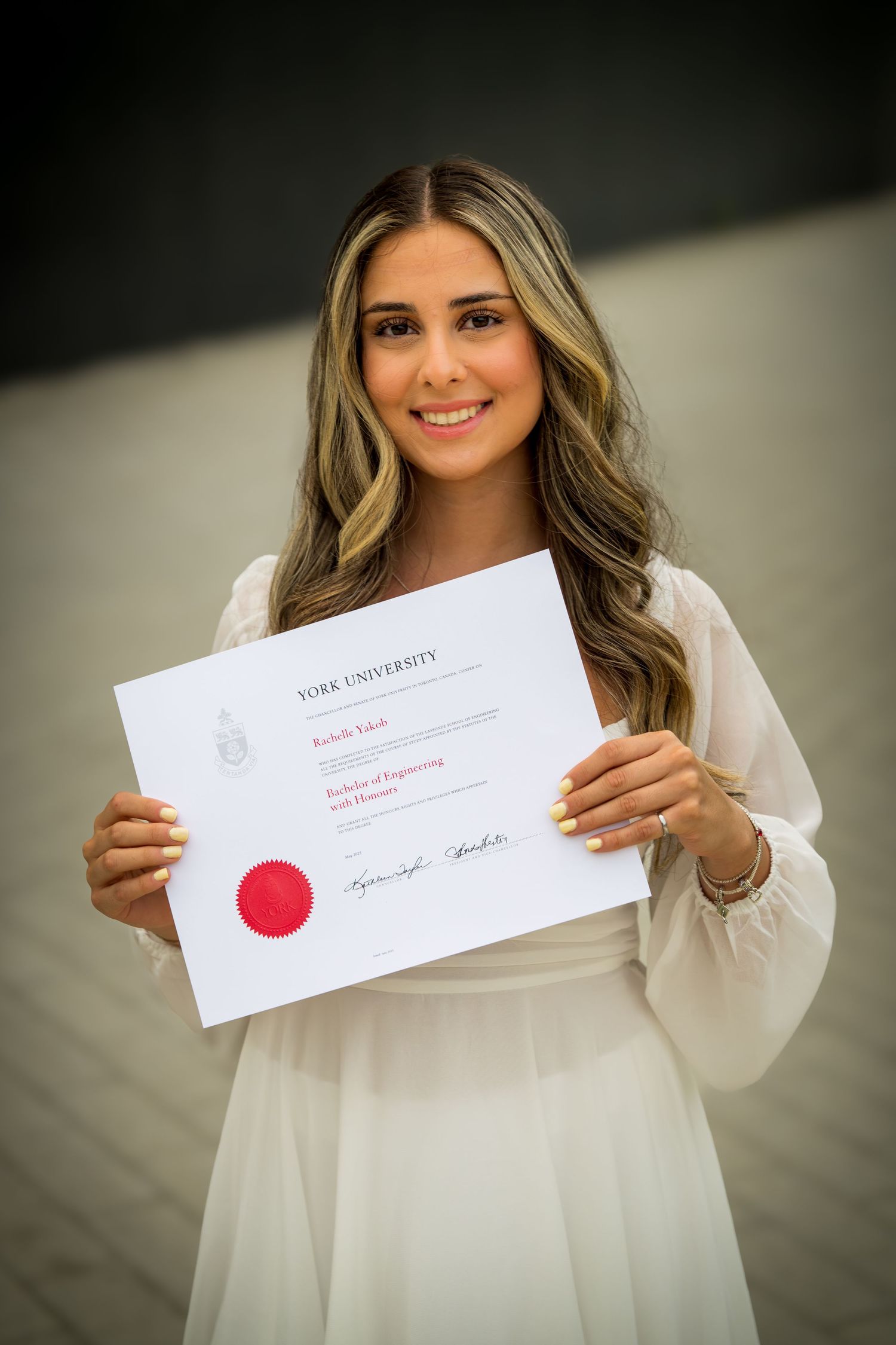 Series of close-up shots showing diploma or certificate with red seal.