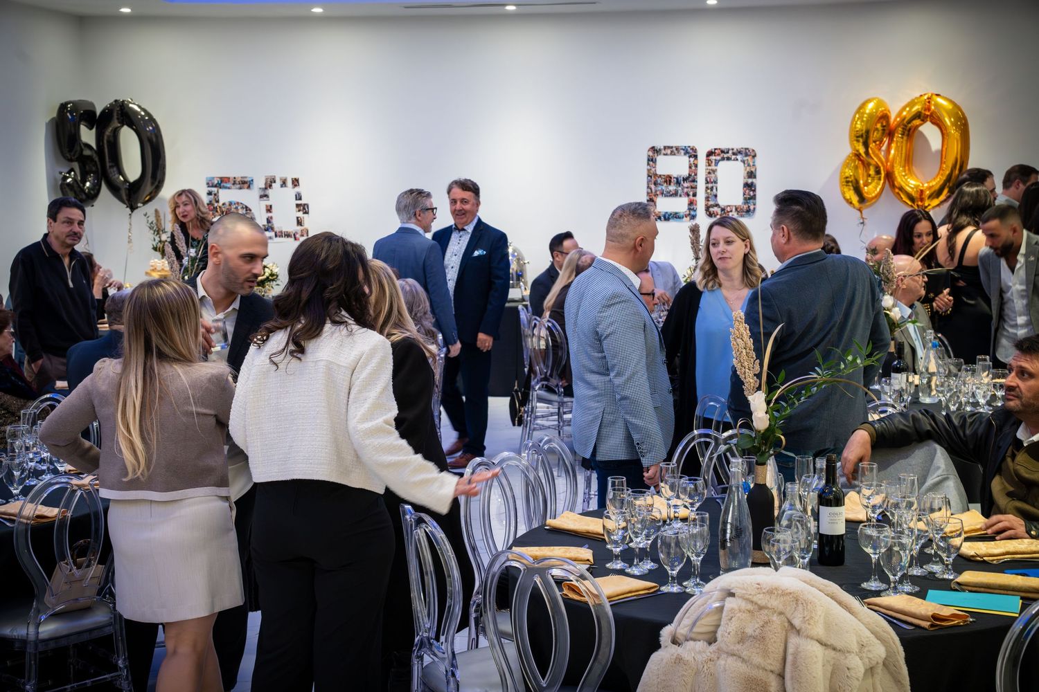 Corporate event space with tables set up for dining and networking under modern lighting.
