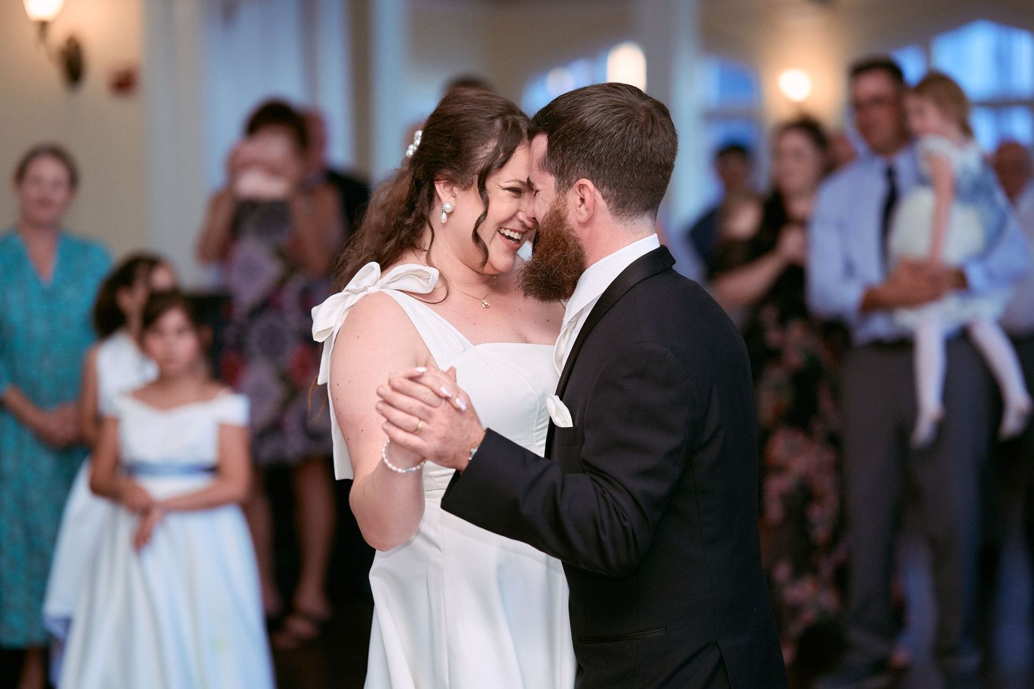 Nelstudios photographs a real and candid moment of the bride and groom during their first dance at Whitby Castle, Rye, Westchester, NY.