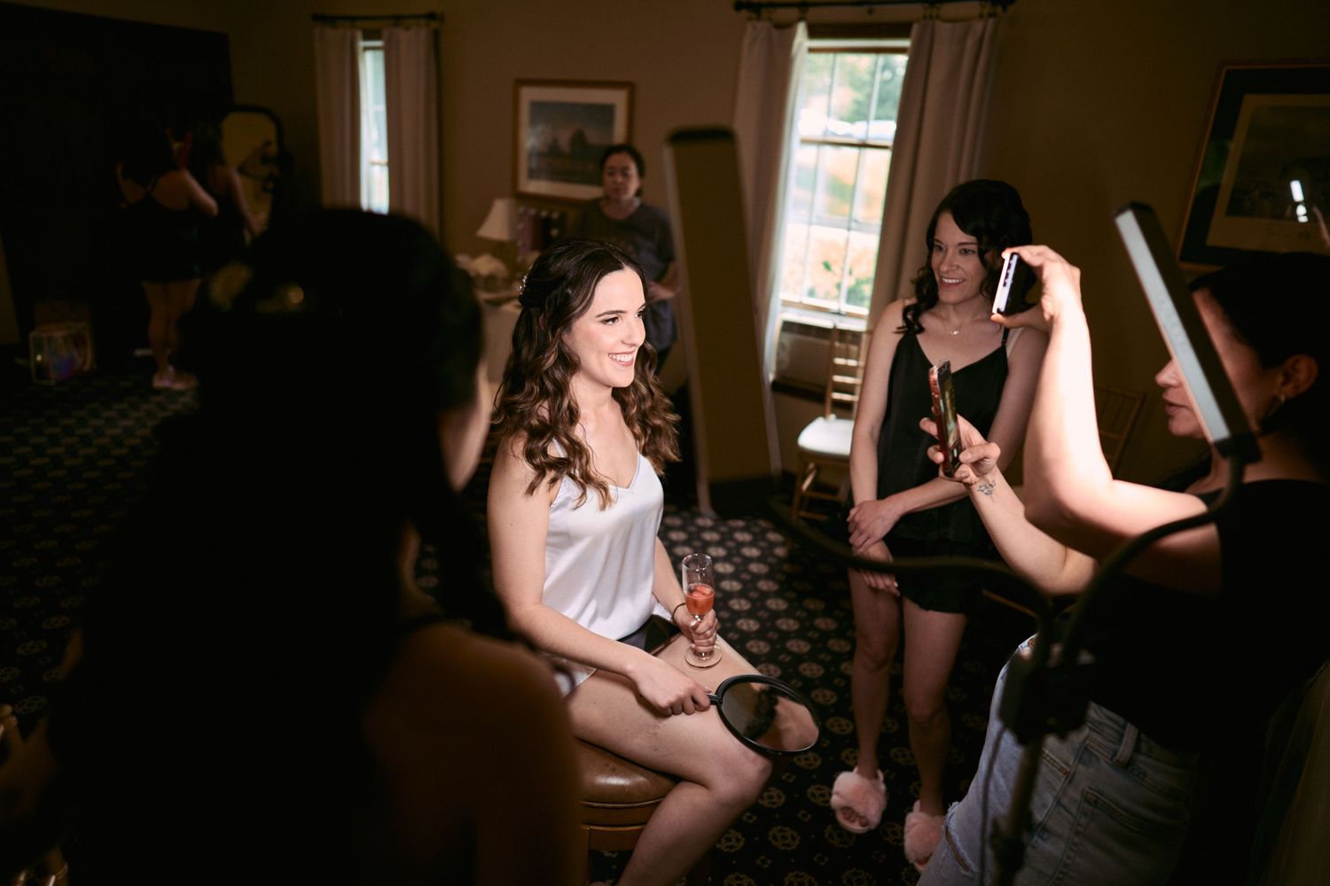 Nelstudios photographs a natural and authentic moment of the bride getting ready during her wedding in Westchester, NY.