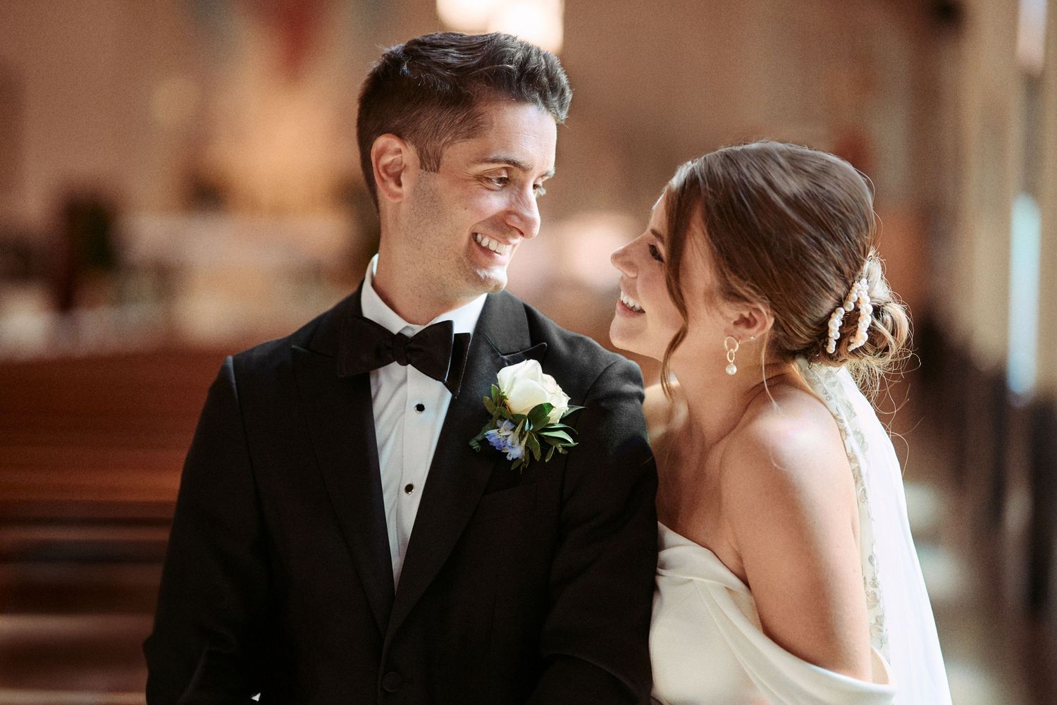 Nelstudios photographs a bride and groom during their wedding ceremony at a church in Westchester, NY.