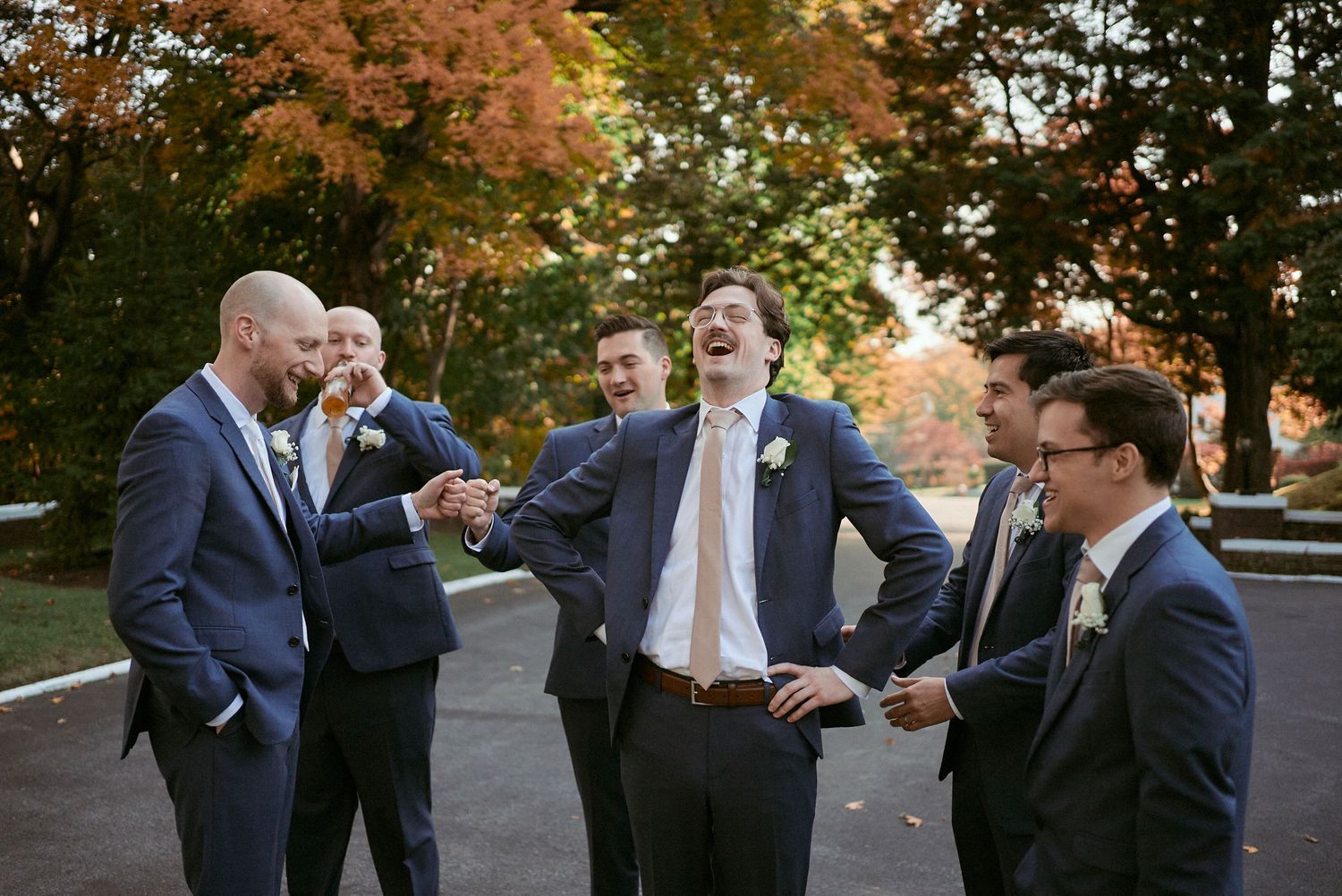 Nelstudios photographs the groomsmen at the Briarcliff Manor in Westchester, NY, where their personalities are candidly captured.