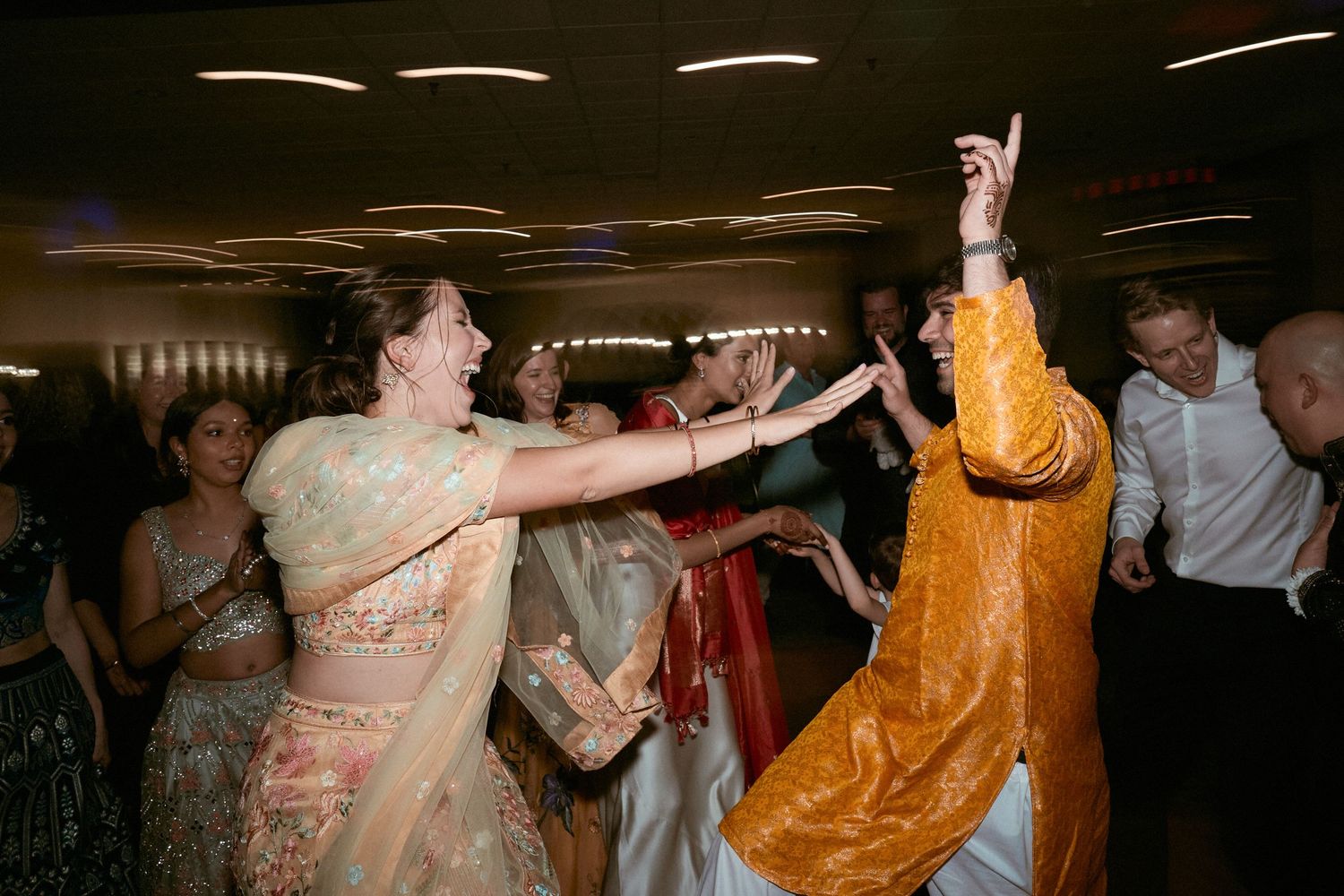 Nelstudios photographs the wedding guests at the Beach & Yacht Club in Mamaroneck NY, in Westchester, where they dance the night away.