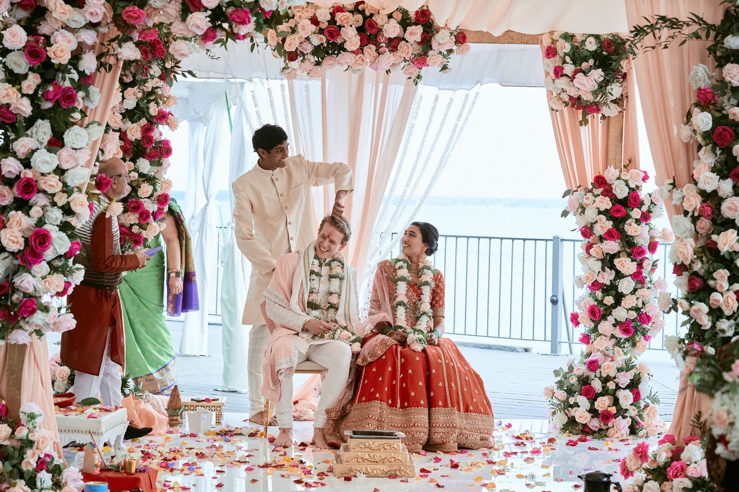 Nelstudios photographs a bride and groom at the Beach & Yacht Club in Mamaroneck NY, in Westchester where the ceremony is full of flowers.