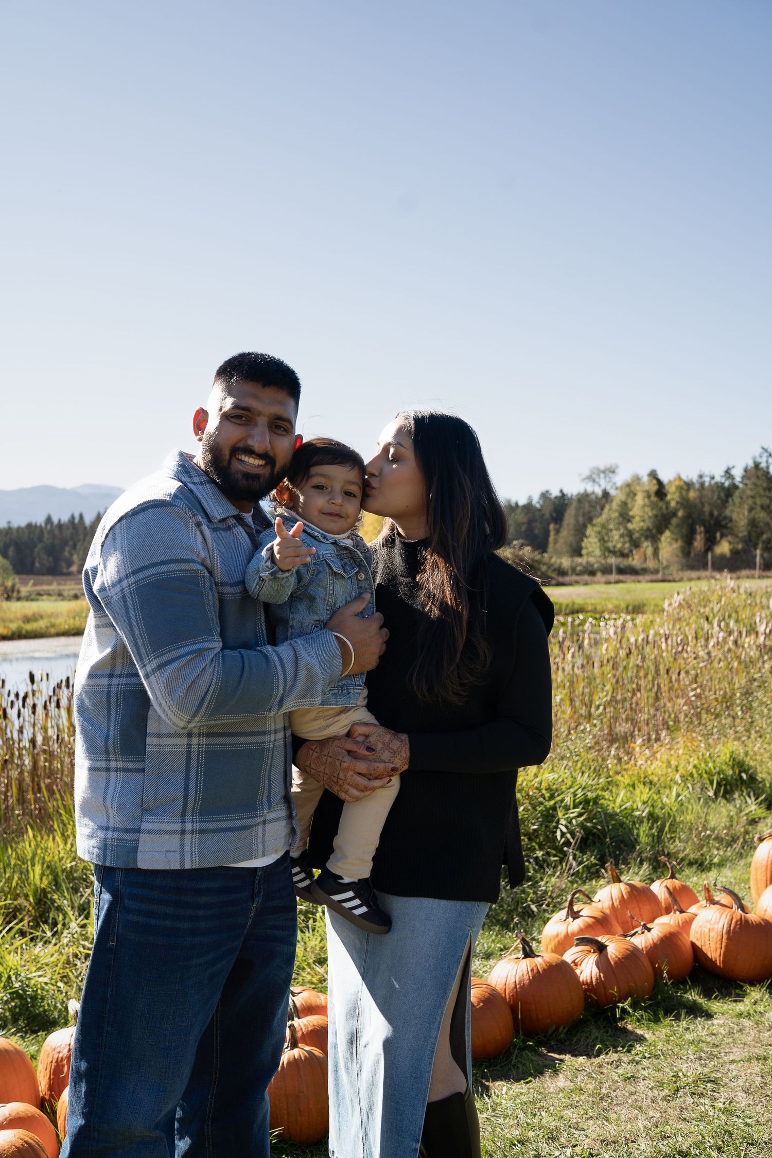 Naniamo, BC family photographer capturing a family of three in the beautiful outdoors.