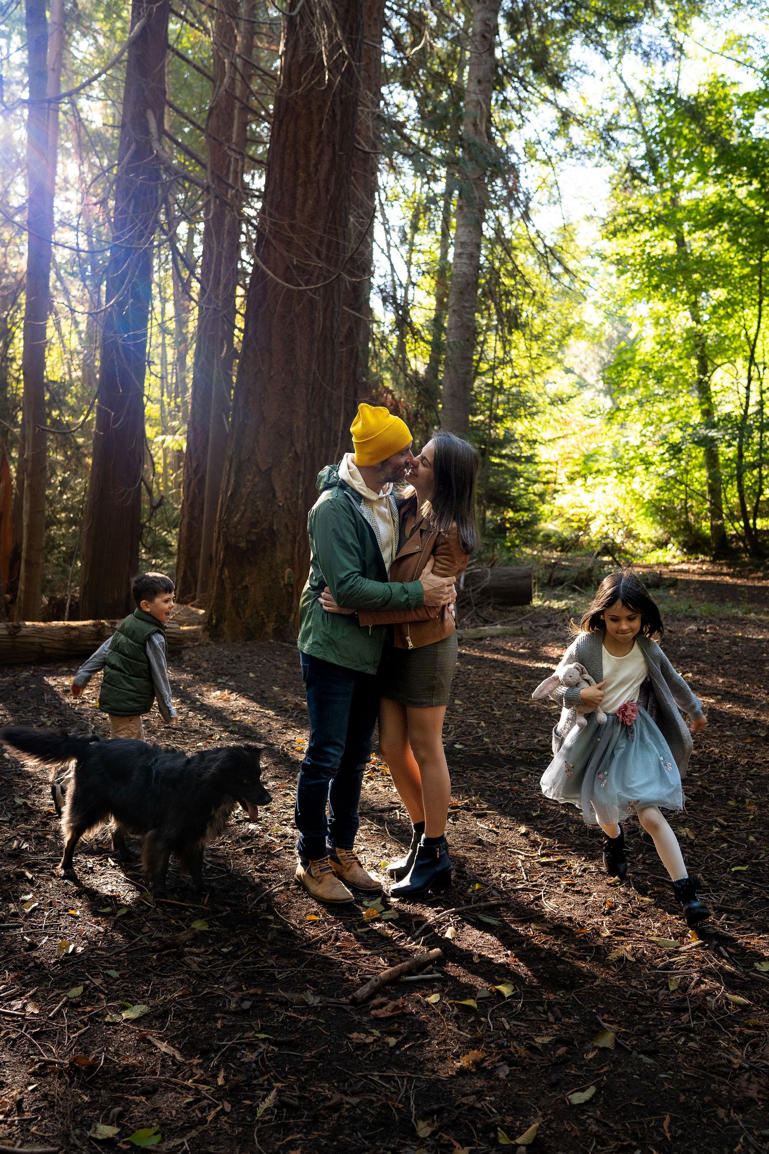 Nanaimo, BC family photographer capturing a joyful family playing together outdoors