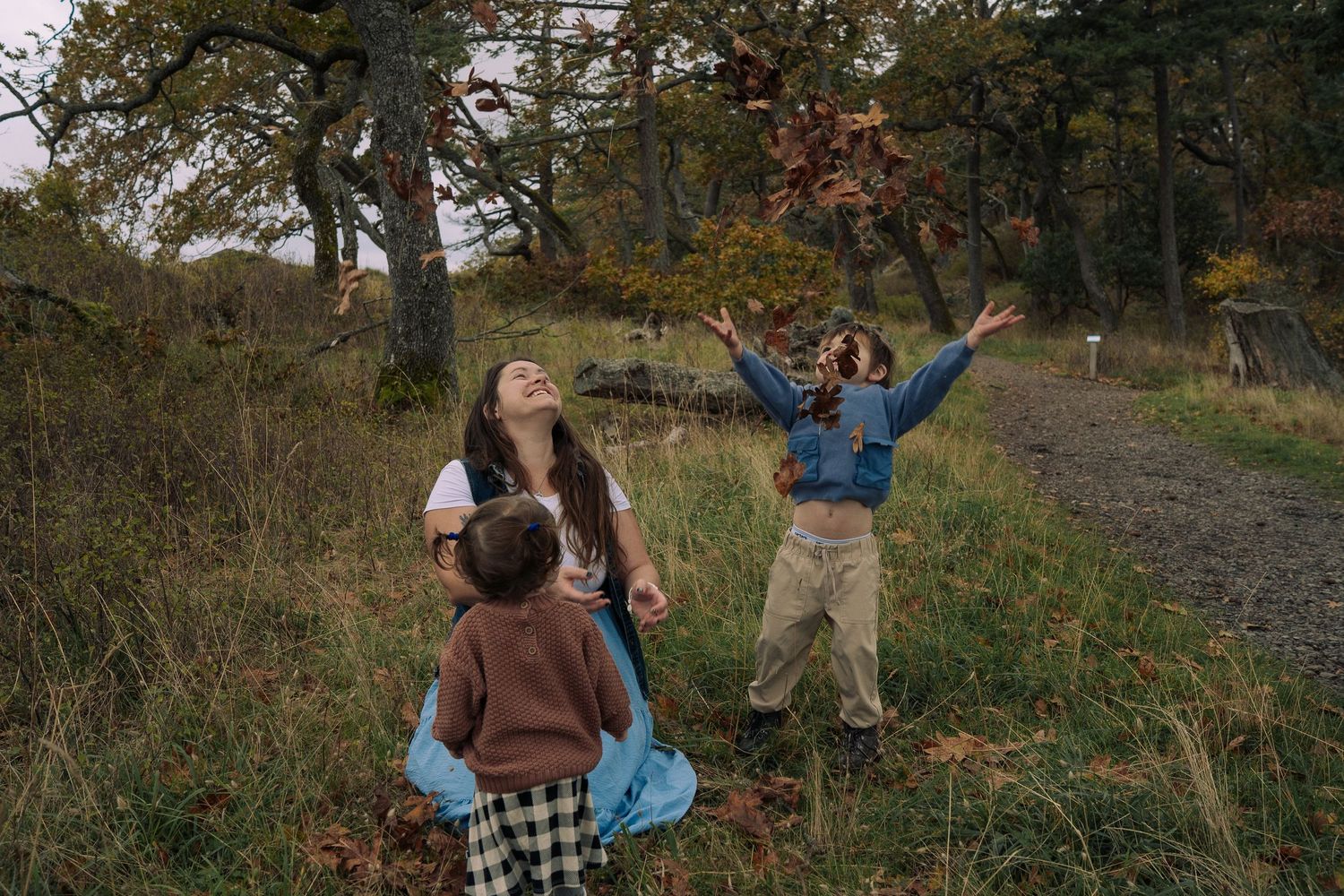 Nanaimo, BC family photographer capturing a joyful family playing together outdoors