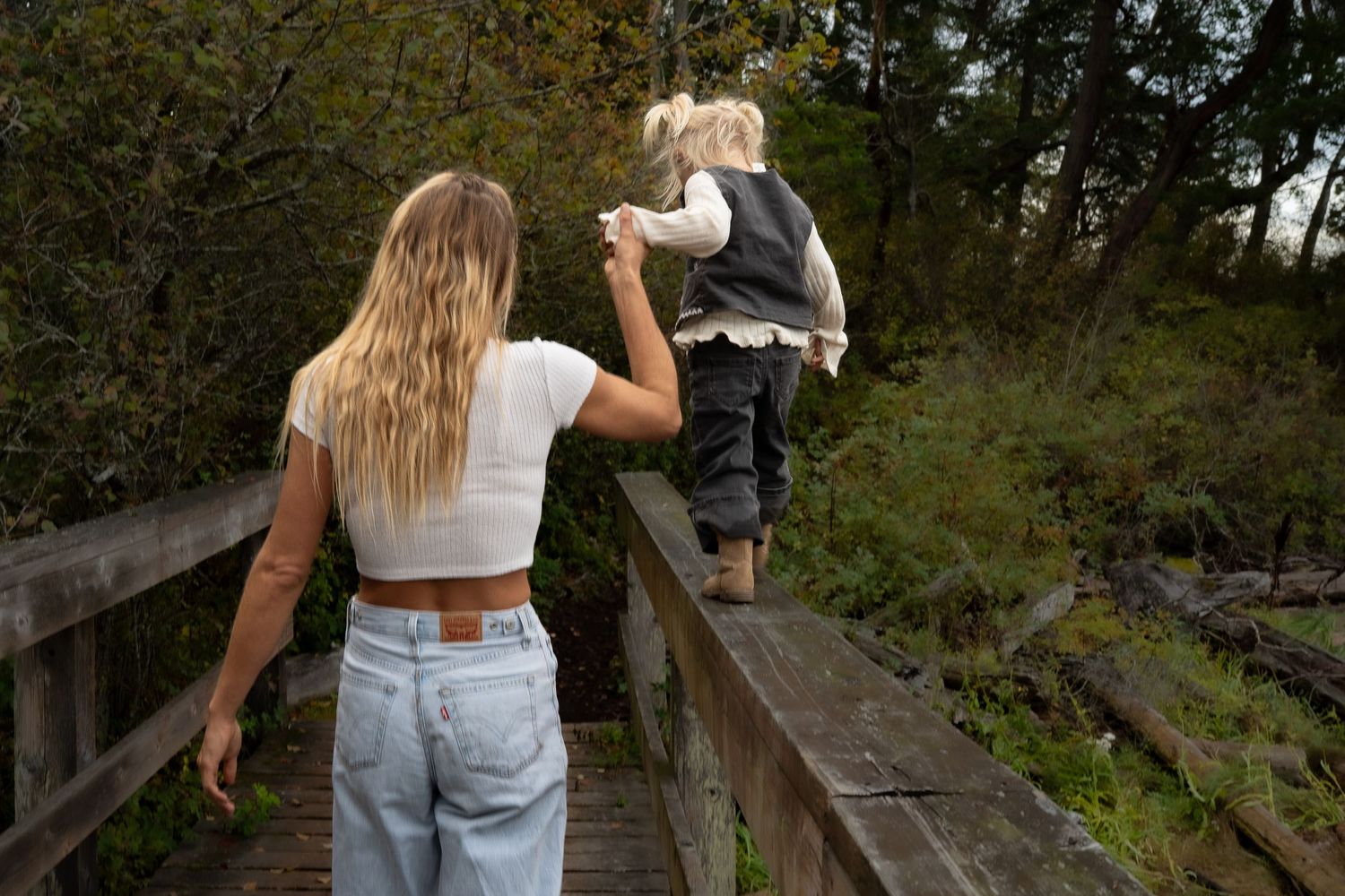 Nanaimo, BC family photographer capturing a joyful family playing together outdoors