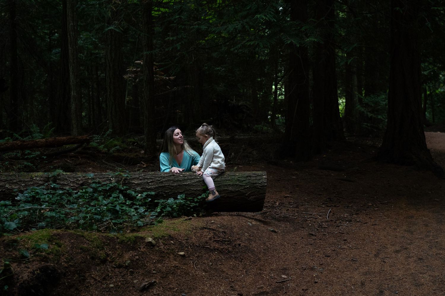 Nanaimo, BC family photographer capturing a joyful family playing together outdoors